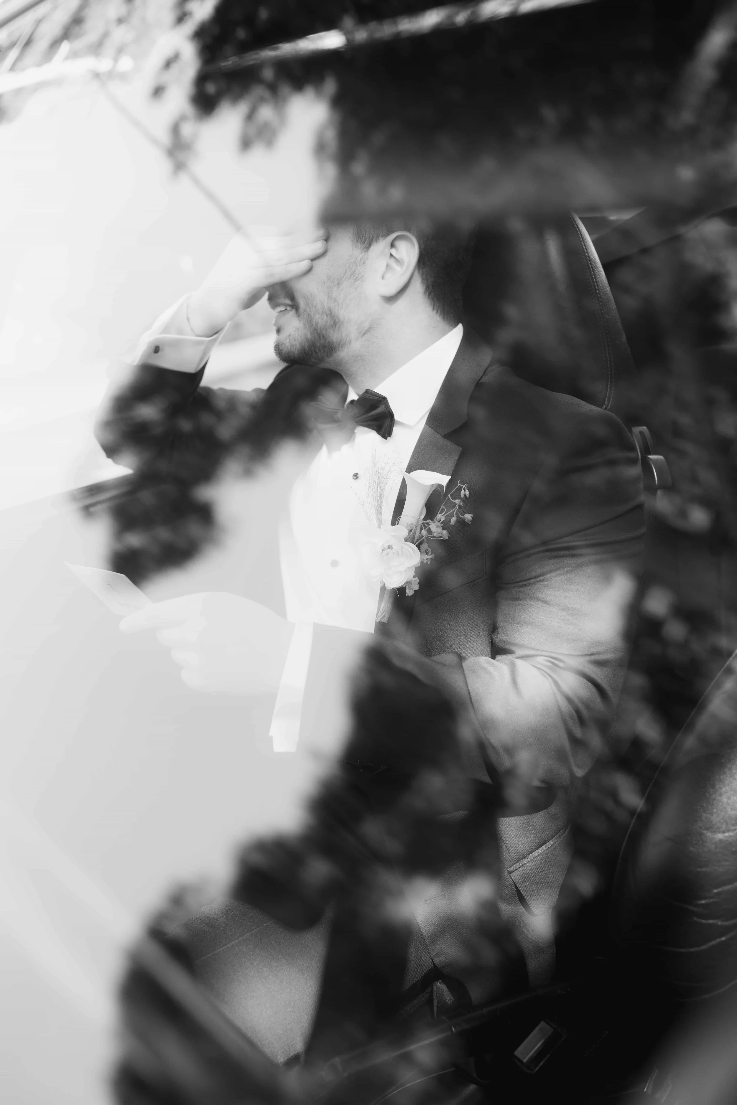 emotional groom after getting gift from bride