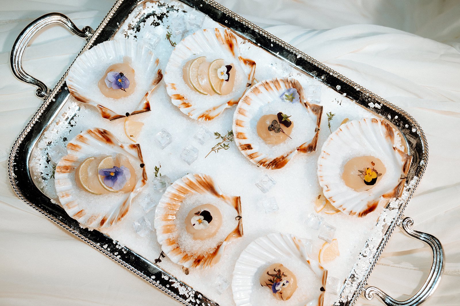 clams in a silver tray 