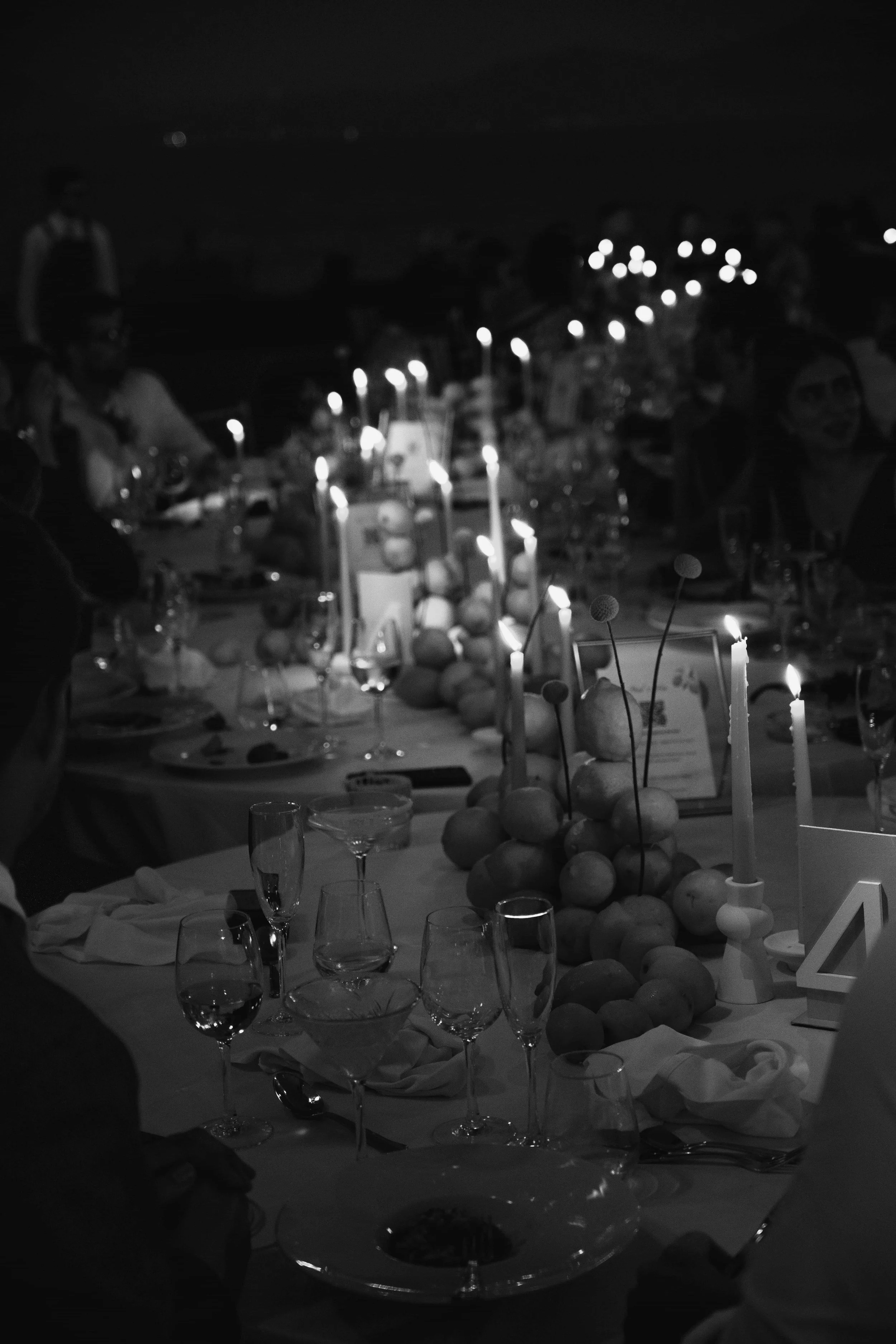 black and white lemon wedding with lit candles