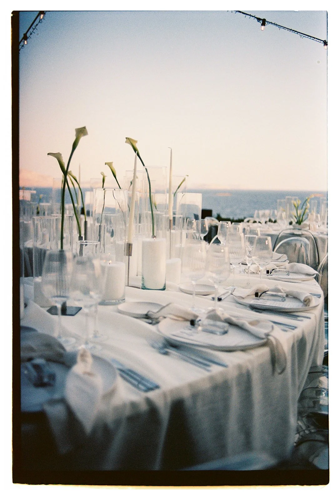 white wedding setup during sunset