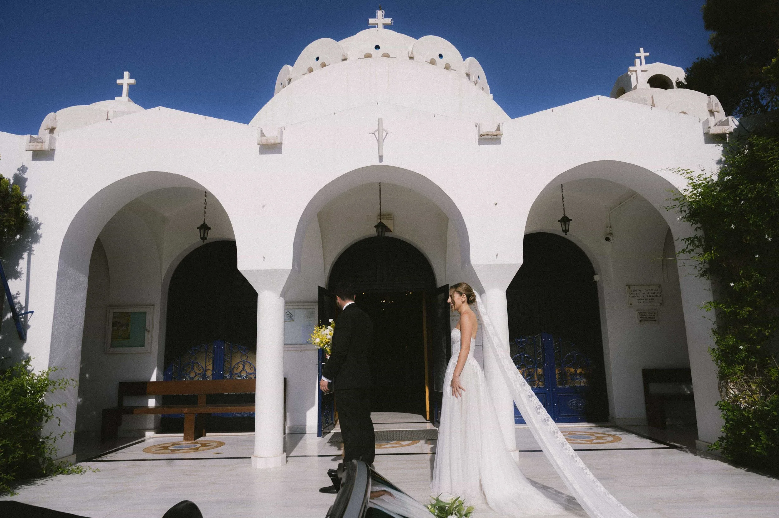first look in front of church 