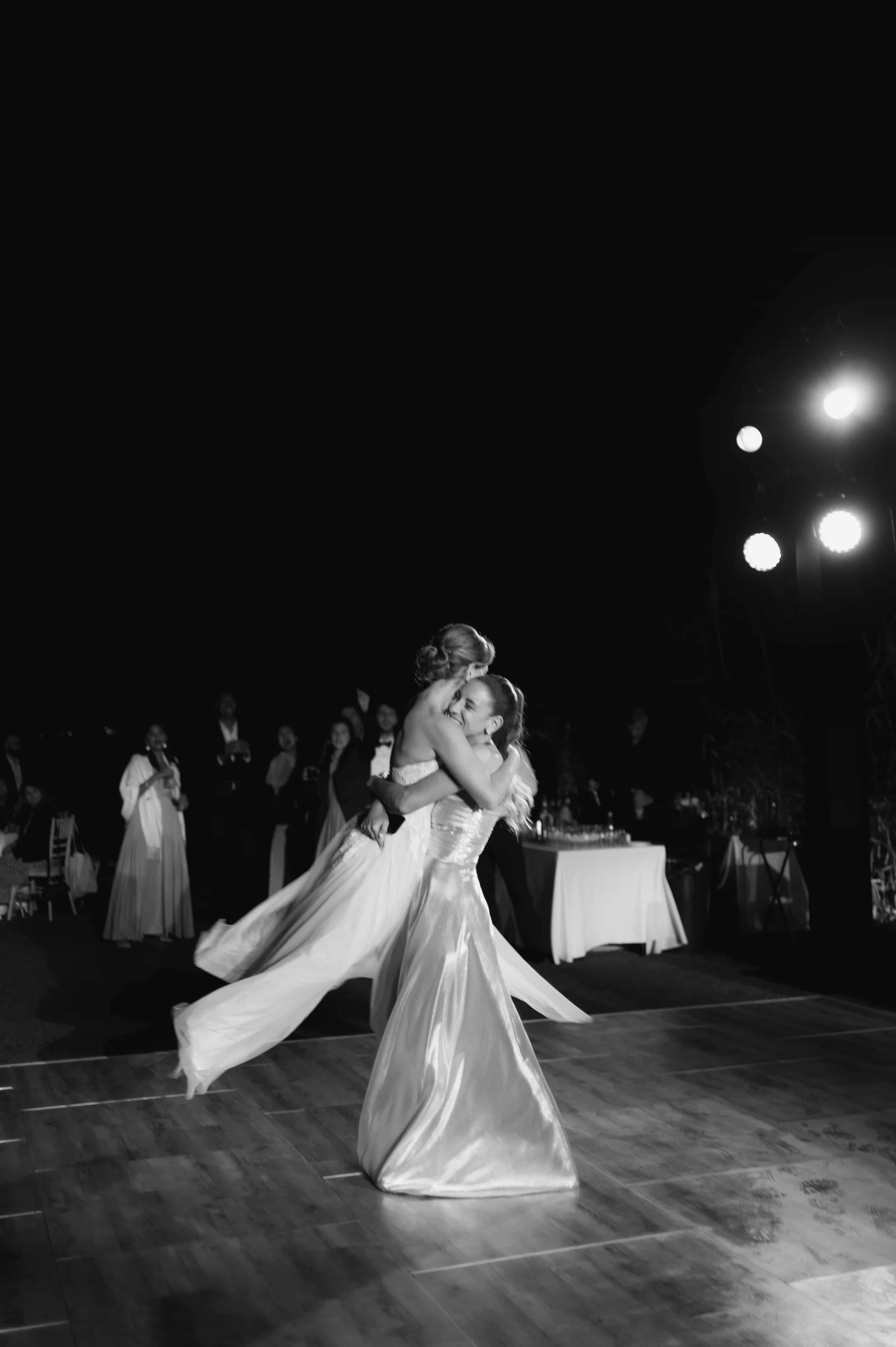 bride and twin sister dancing