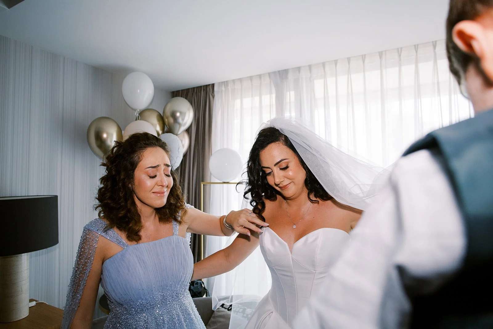 emotional moment for bride and her sister