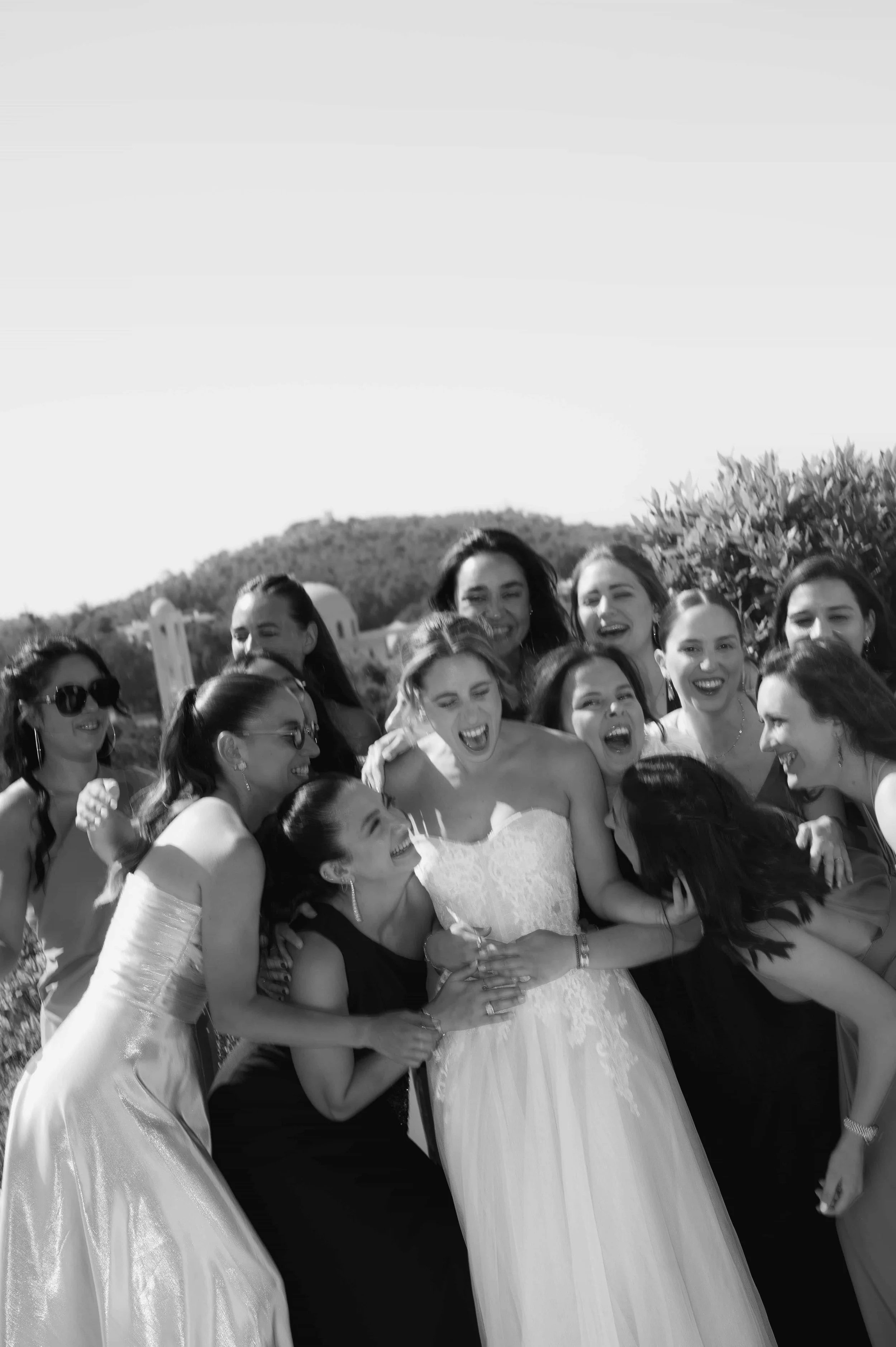 bride and friends laughing