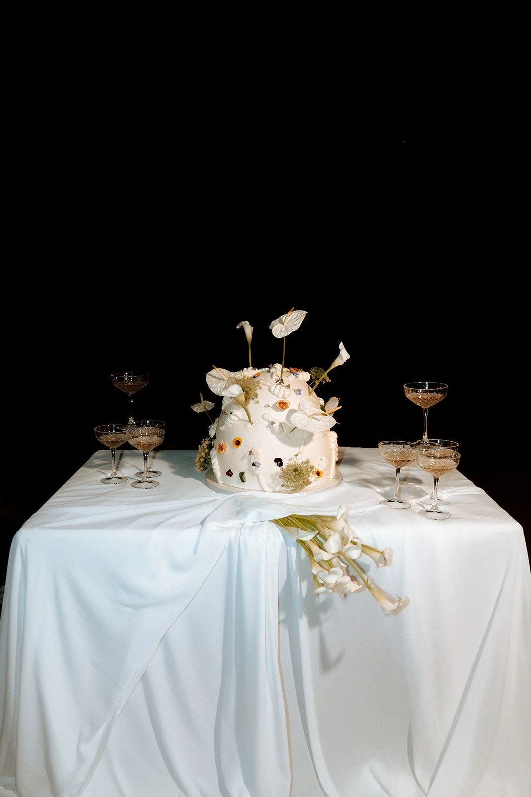 contemporary wedding cake and champagne 