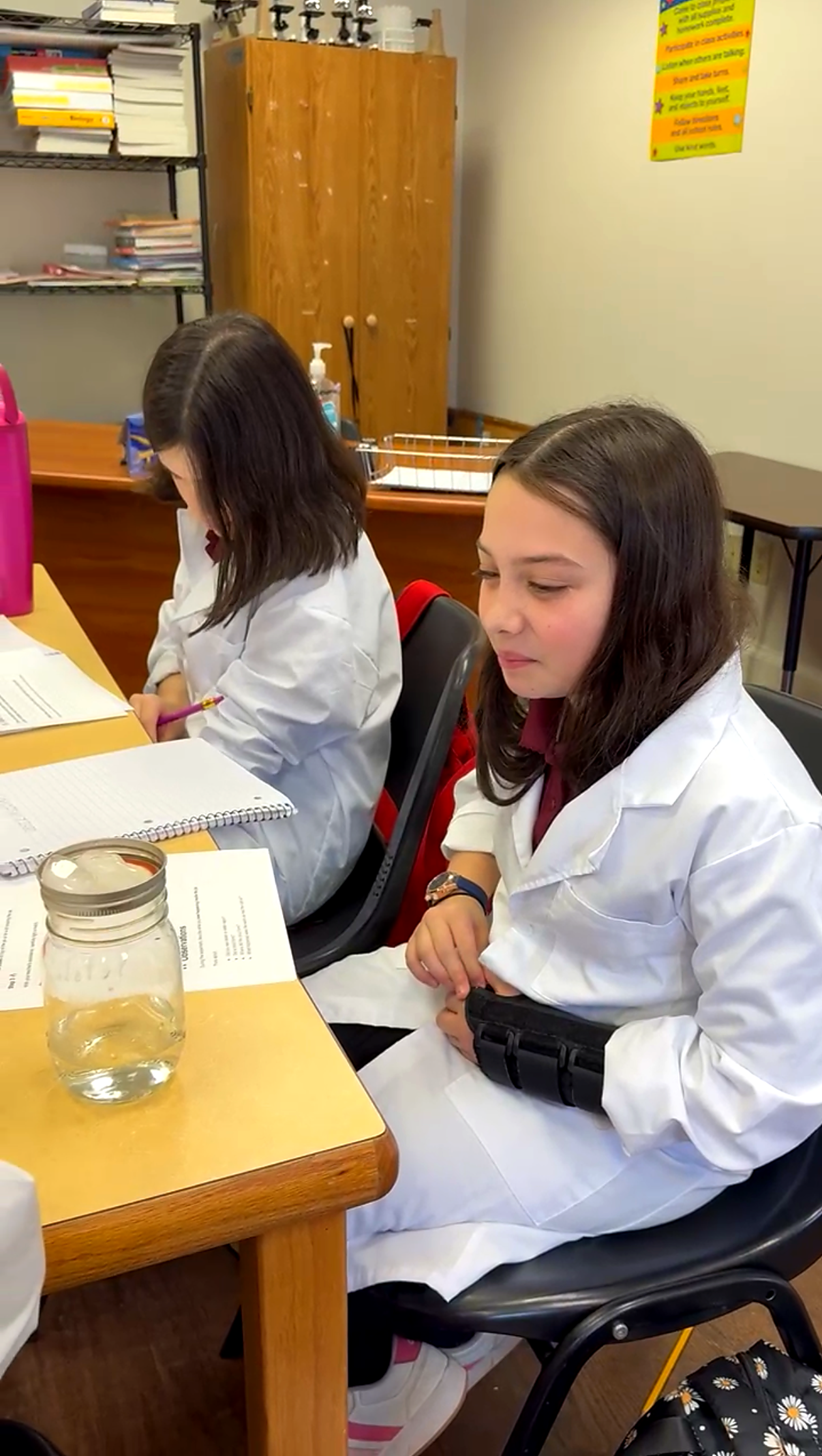 photo3_girls_labcoats.png