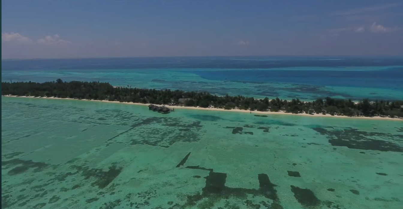 Maldives island resort surrounded by Indian Ocean
