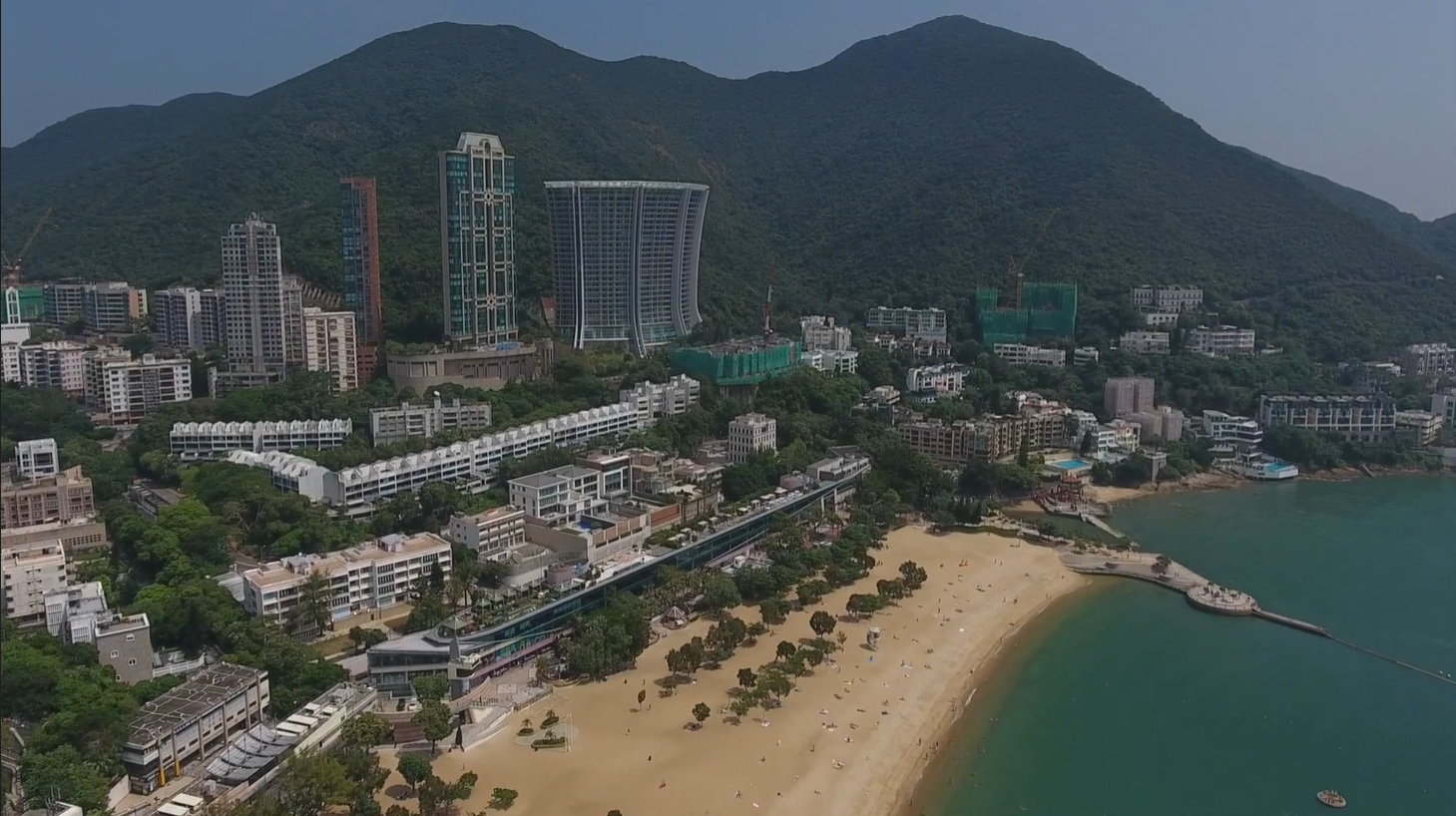 Aerial drone view of Repulse Bay beach and residential high-rises on Hong Kong Island's south side