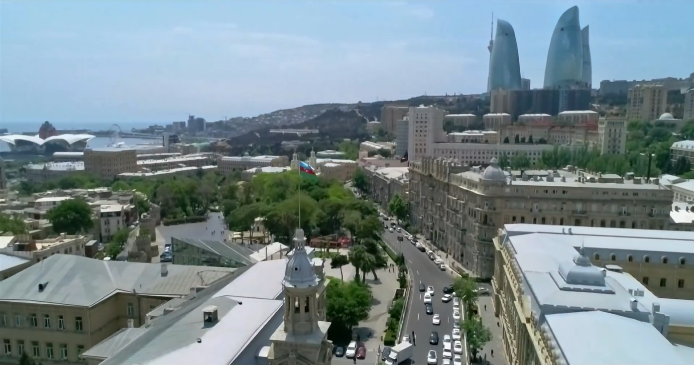 Baku Old City and modern skyline contrast from drone