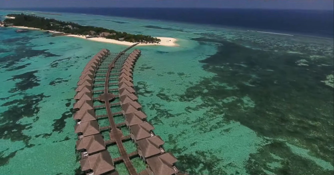 Aerial view of overwater bungalows in the Maldives