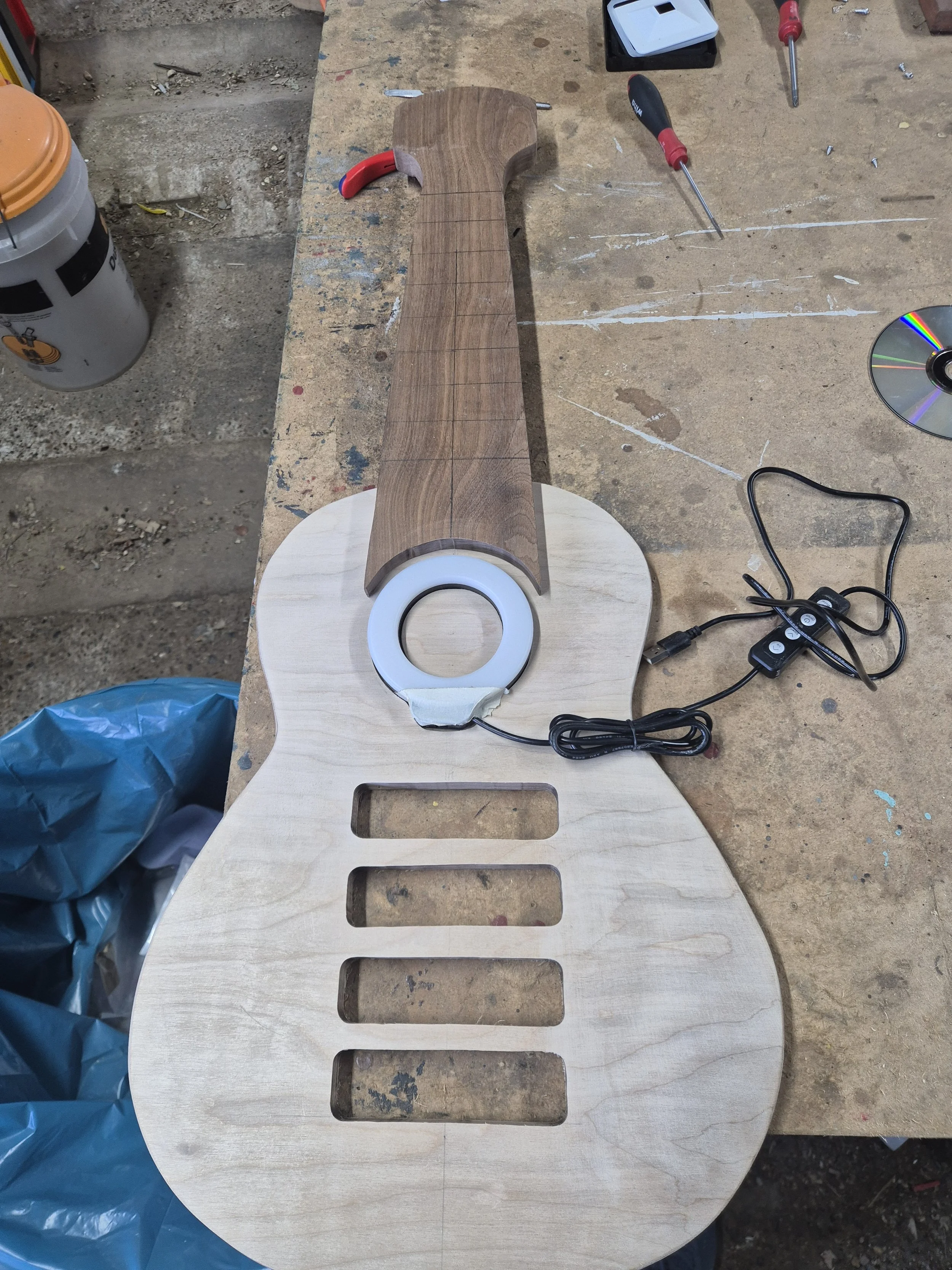 I had an idea to make a standing desk - but I wanted it to be stylish and fun. This guitar was the result. With a little help from hubby I made this from scratch. I'm pretty proud of it