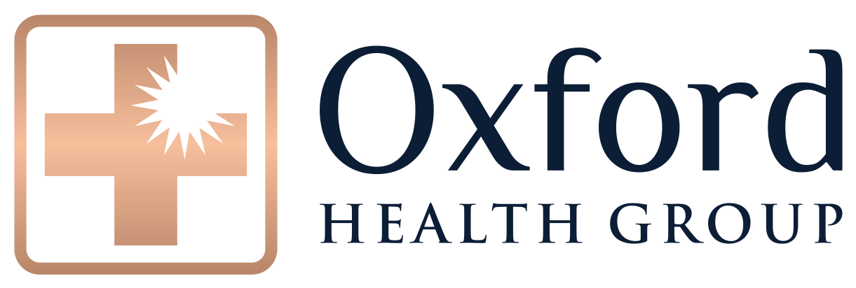 Logo for Oxford Health Group featuring a cross with a starburst in the center and the text 'Oxford Health Group'.