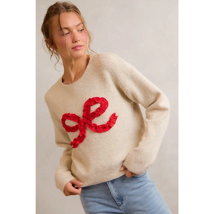 red bow sweater.webp
