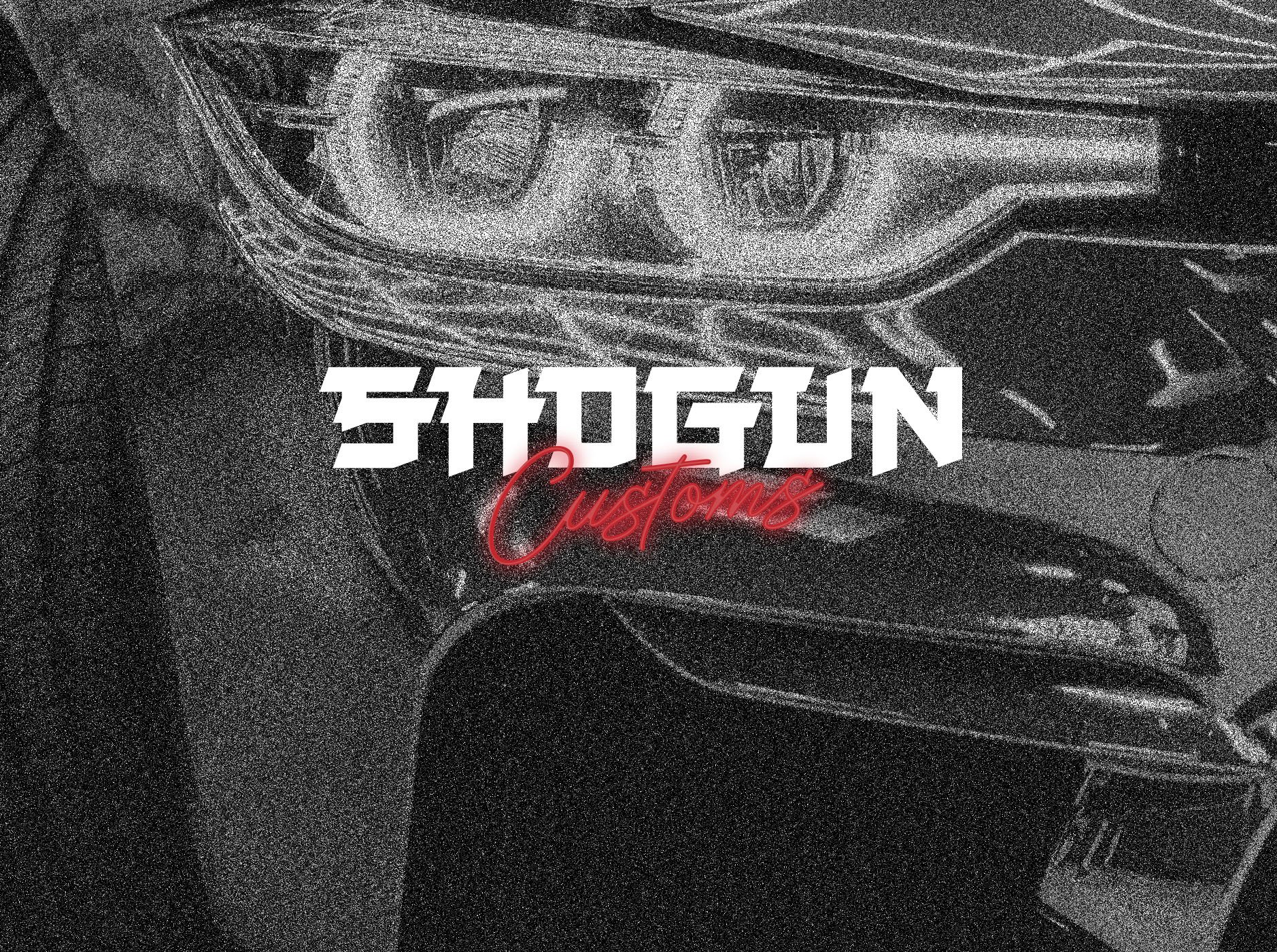 Car headlight with "Shogun Customs" text overlay