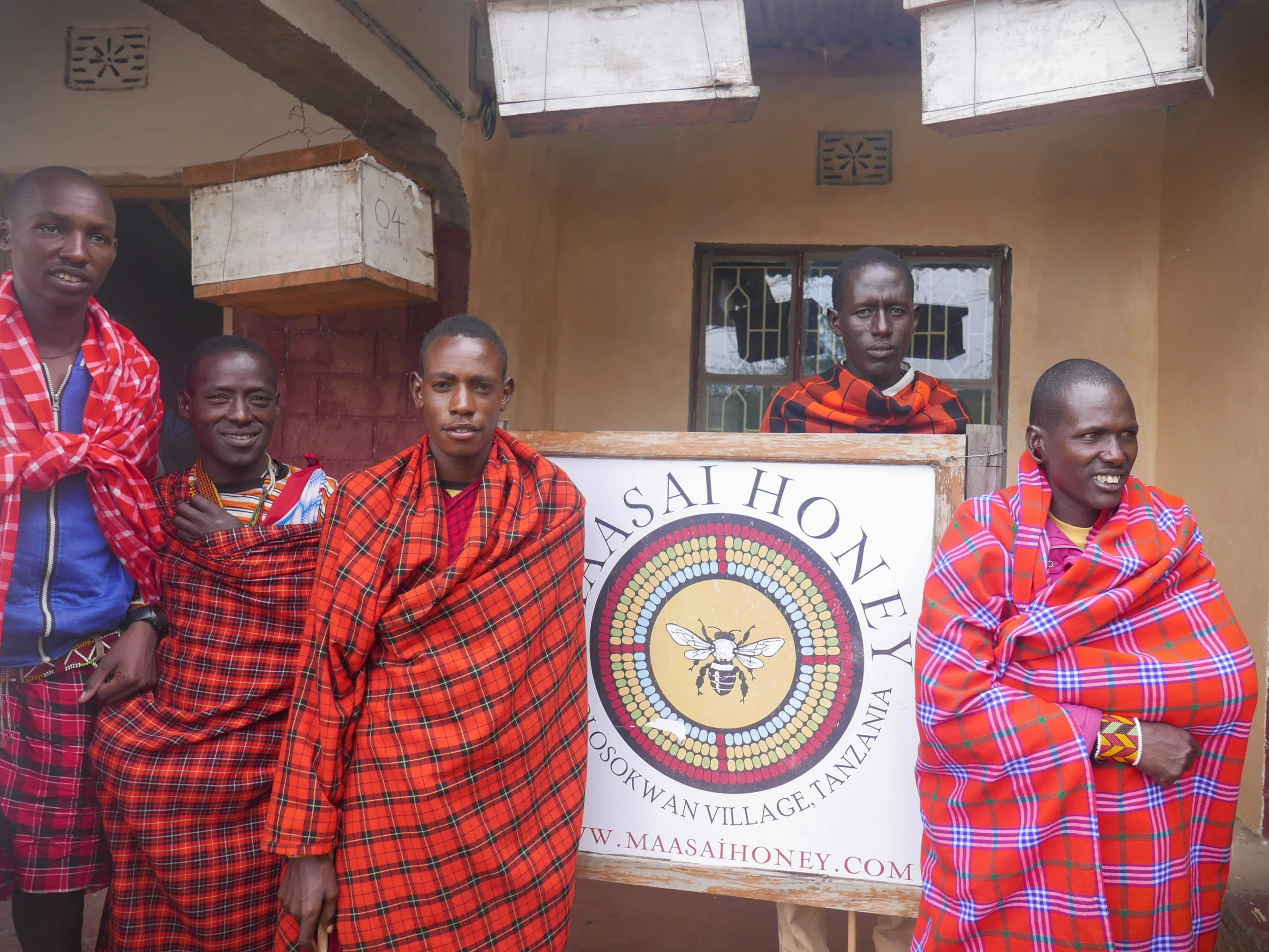 Maasai Honey apiary guards at our office where the stingless beehives are hung.