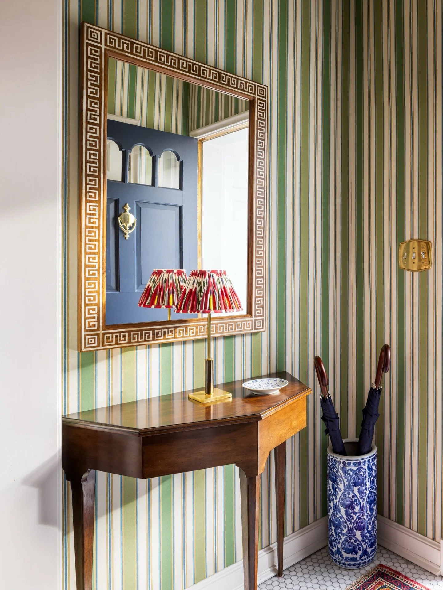 Don&rsquo;t forget to set the stage for your guests in your foyer, as you prepare your home this holiday season. Accents like wallpaper, unique accents, fresh florals and a warm color palette help to welcome your guests, and set the tone for your hom