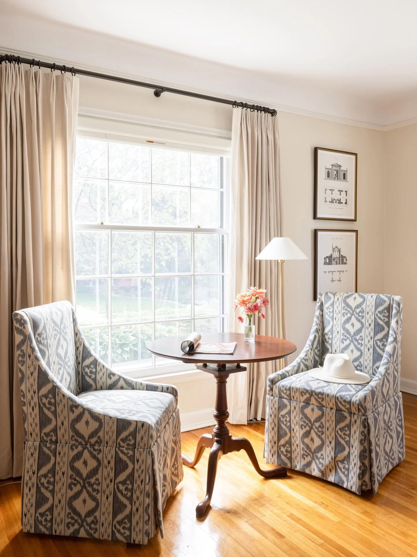 Spring is on the horizon and I can&rsquo;t think of a better place to watch the garden come alive 🌱🪺. Things I love about this space - the chairs are covered in one of my favorite textiles from England, and the antique table is from the Henry Ford 