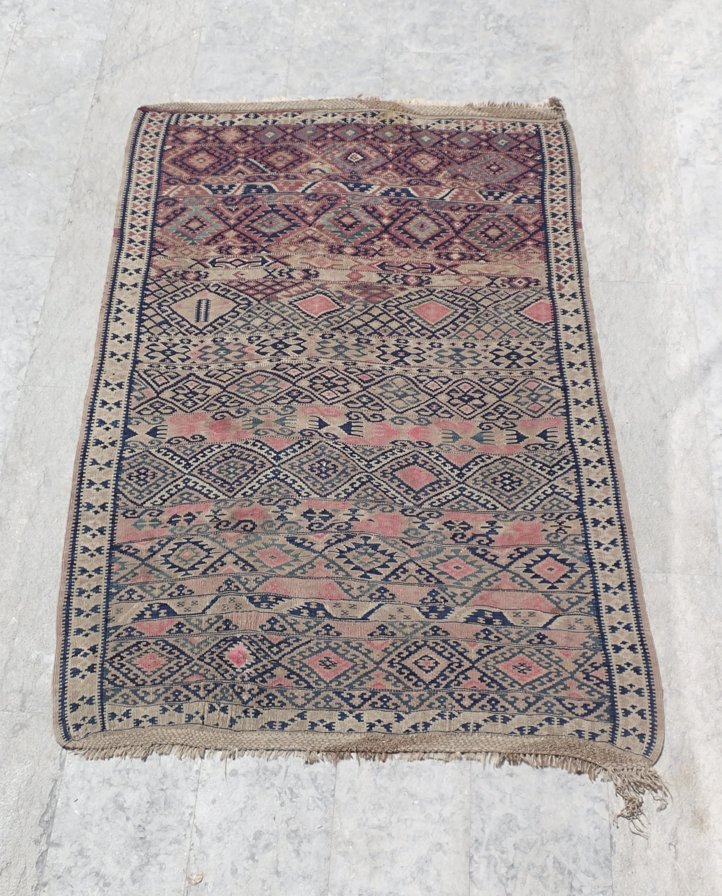Kilim, Herki tribe, 53 3/4” x 79”, © 1900, 100% 		Wool, $900