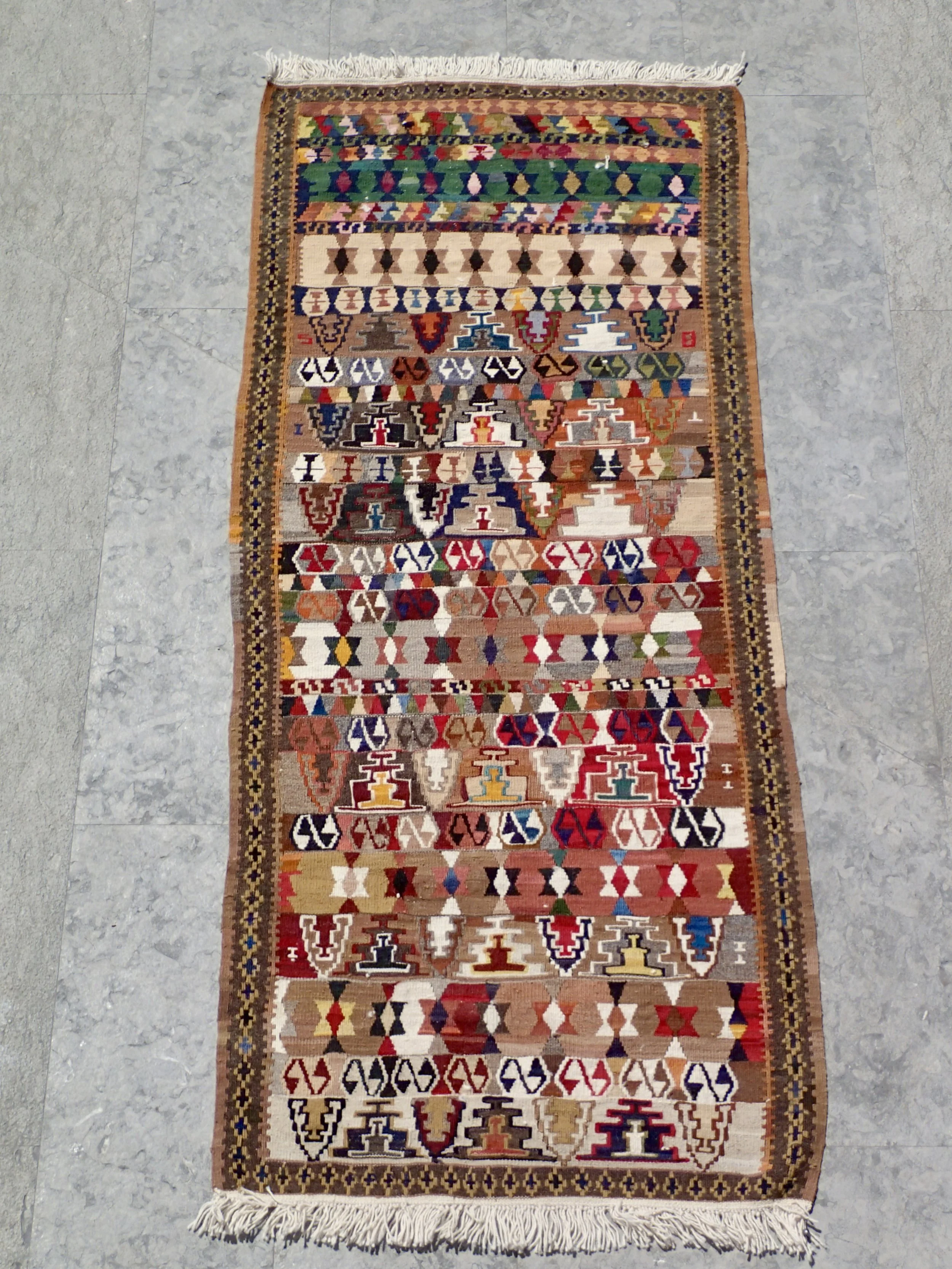 Kilim, Elibende motif, 34 1/4” x 76 1/2”, © 1950s, 		100% wool, $475
