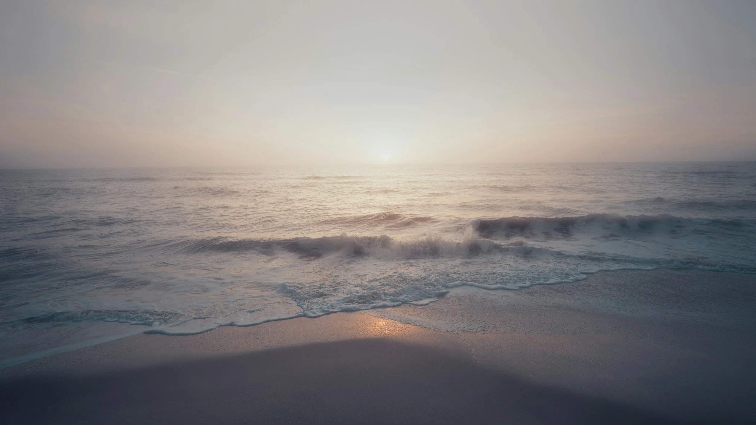 beach waves at sunrise