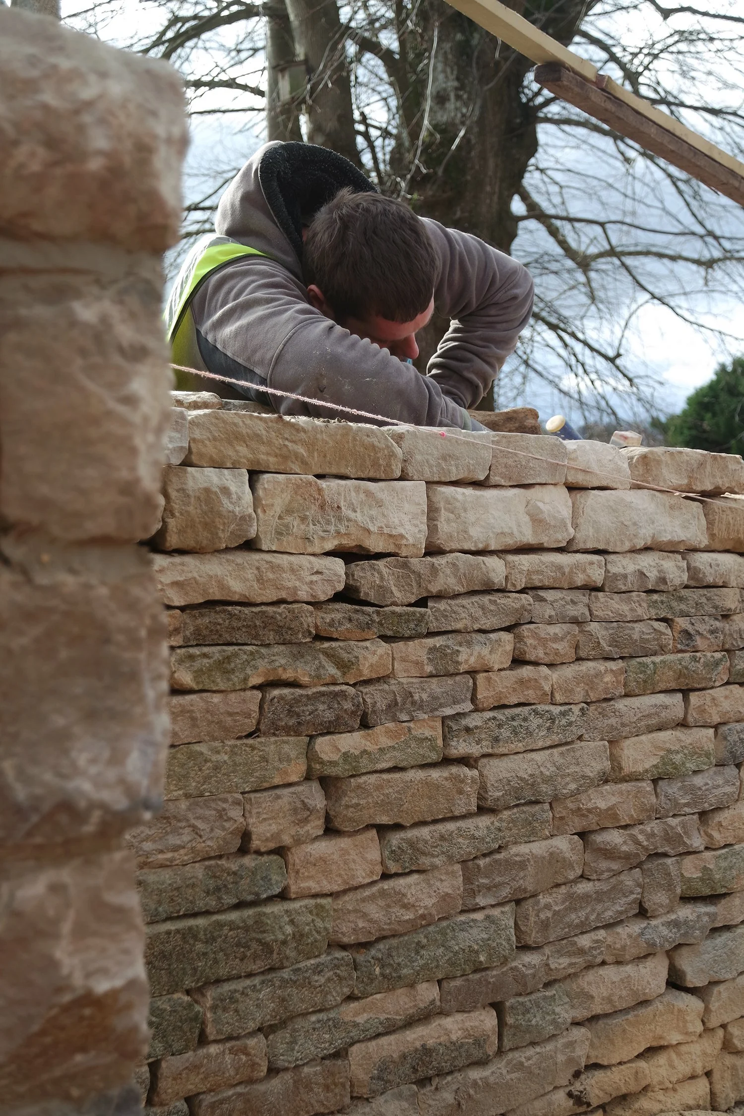 Working on wall sm.jpg