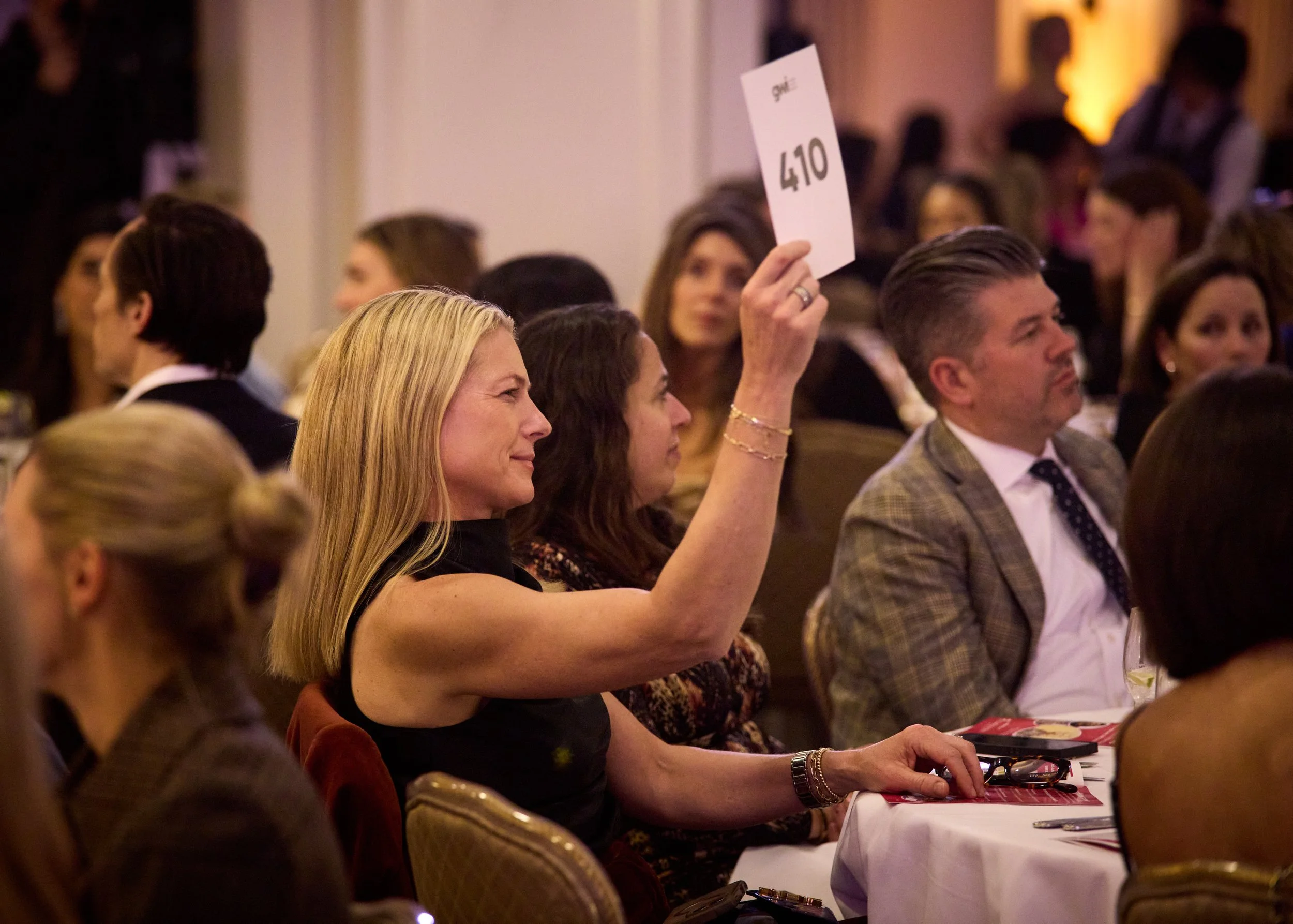Auction and paddle raise at the 2026 GWI Trailblazer Gala