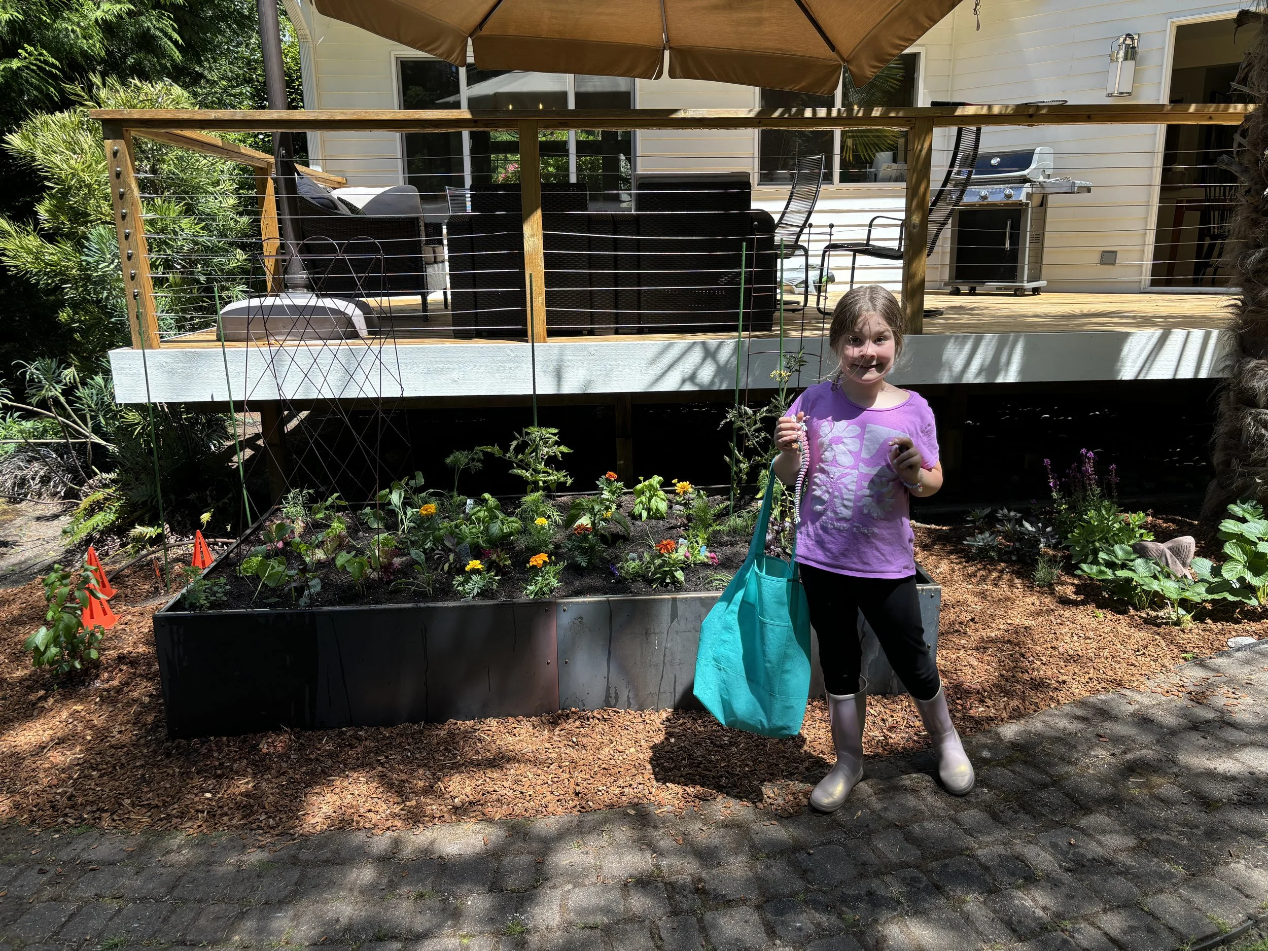 My garden helper showing off her hard work