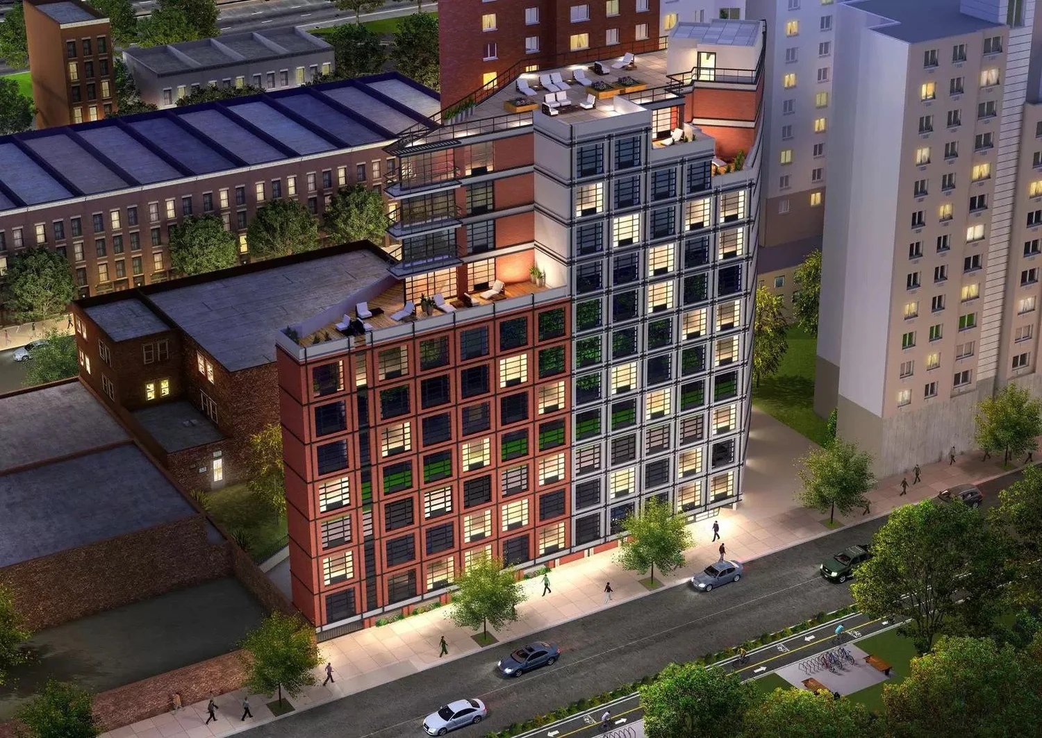 329 East 132nd St: a red-brick and dark-gray residential building seen from above at dusk