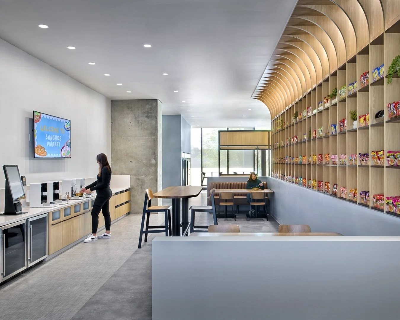 What was once an underutilized corner of campus is now a vibrant, culture-driven destination. Inspired by the company&rsquo;s origins as a small Korean trading shop, the Ramen Bar + Sanghoe Market reimagines the workplace amenity as both a social hub