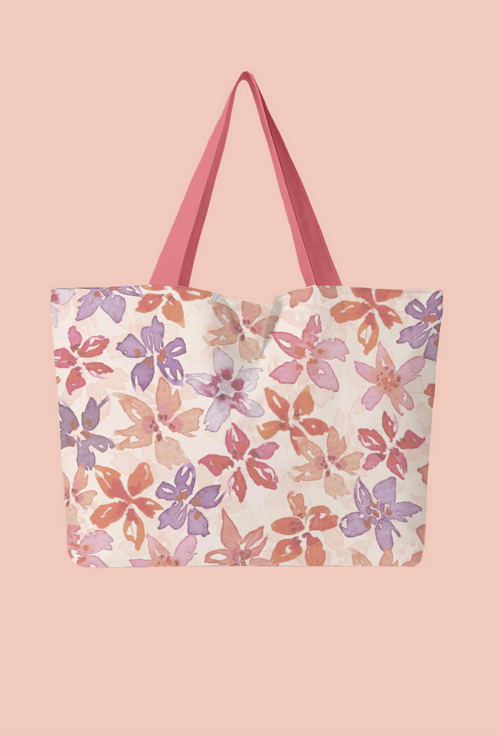 Tote bag mockup featuring a dense watercolour floral pattern in peach, mauve and purple tones with soft painterly petals. Seamless floral repeat shown on accessories.