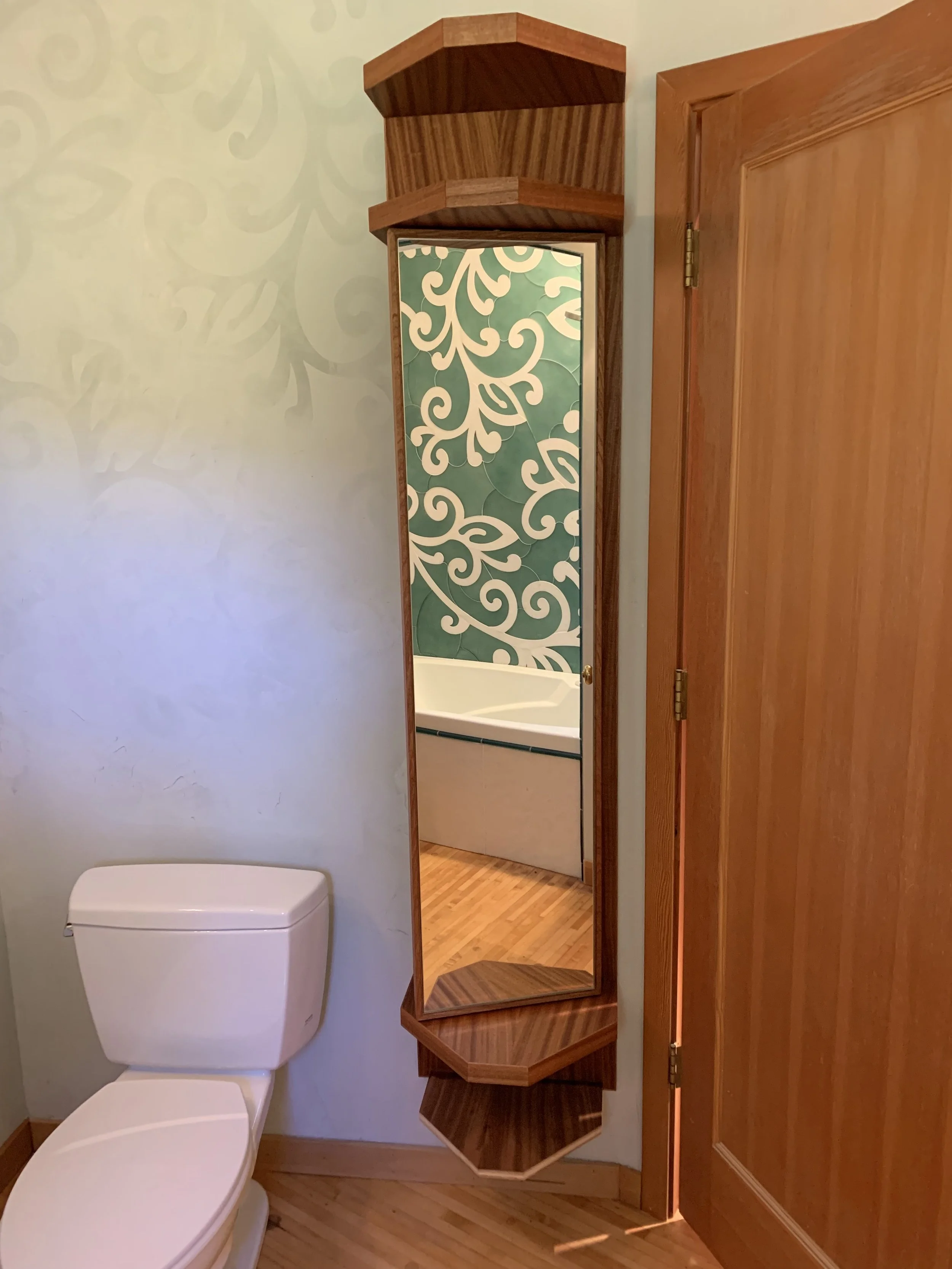 Bathroom renovation with custom tile and custom cabinetry 