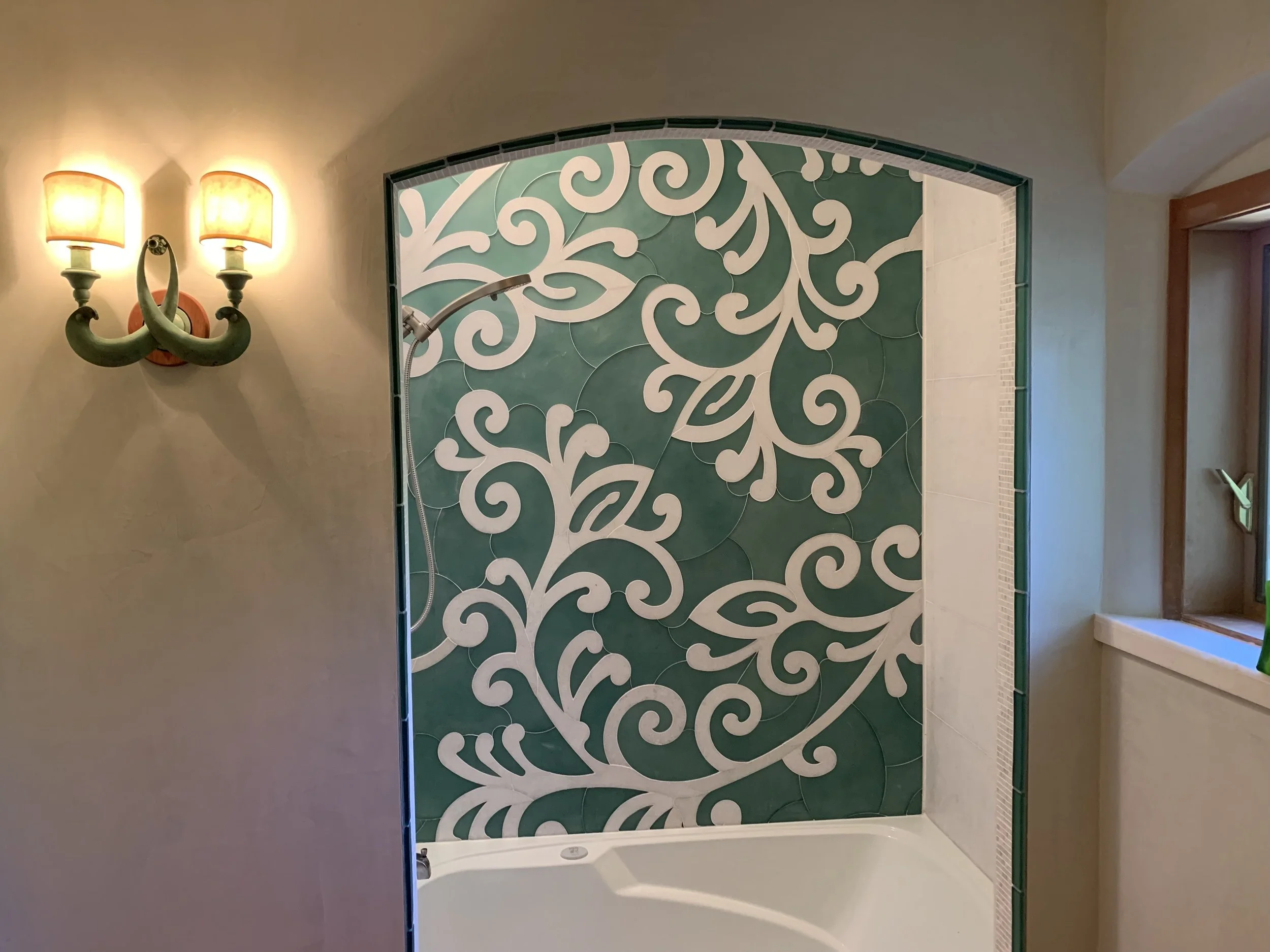 Bathroom renovation with custom tile and custom cabinetry 