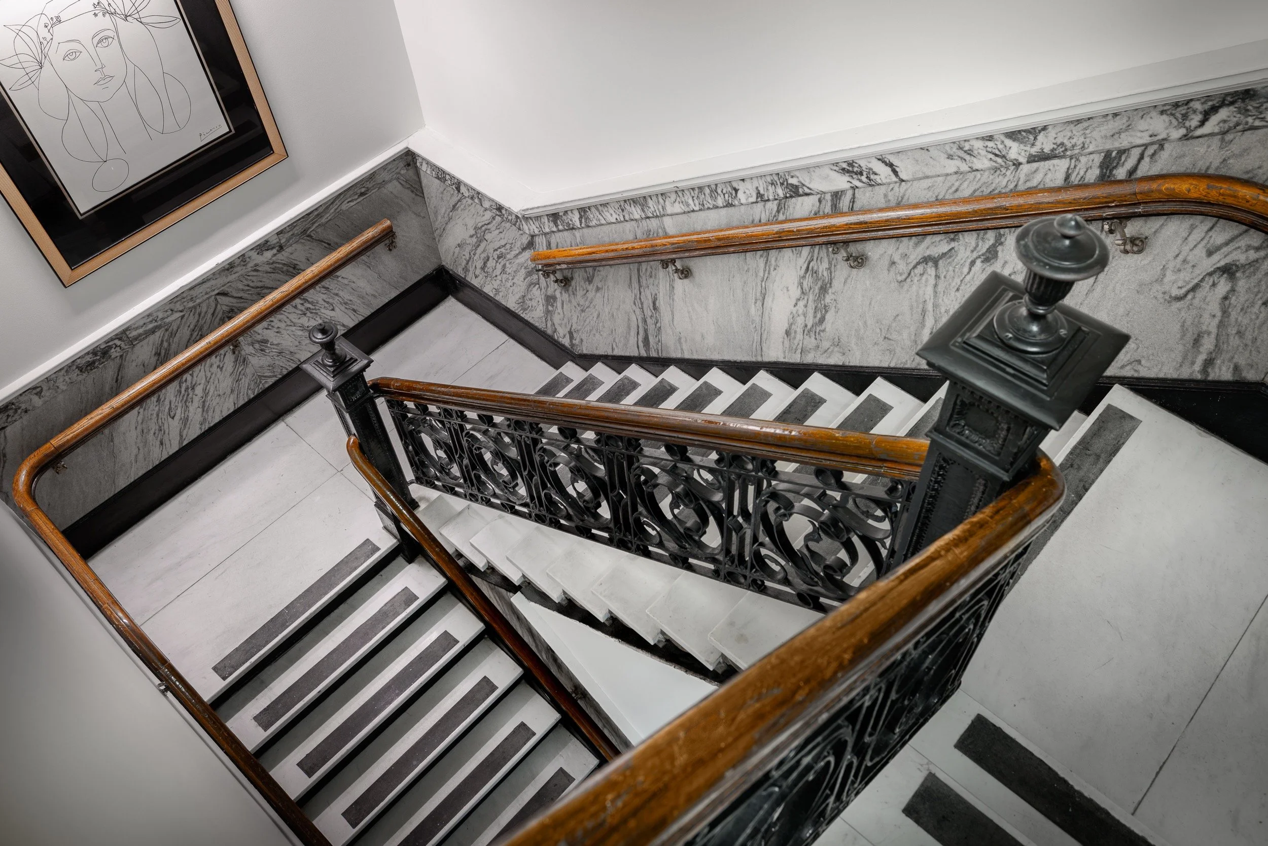 917 Franklin - Restored Staircase with Limited Picasso Print.jpg