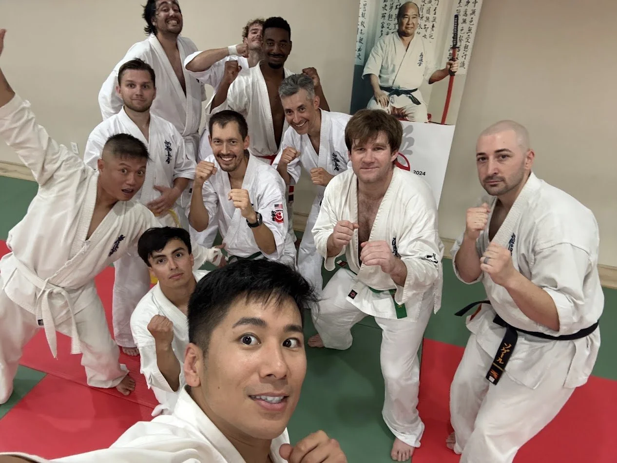 Post-training group selfie in the dojo