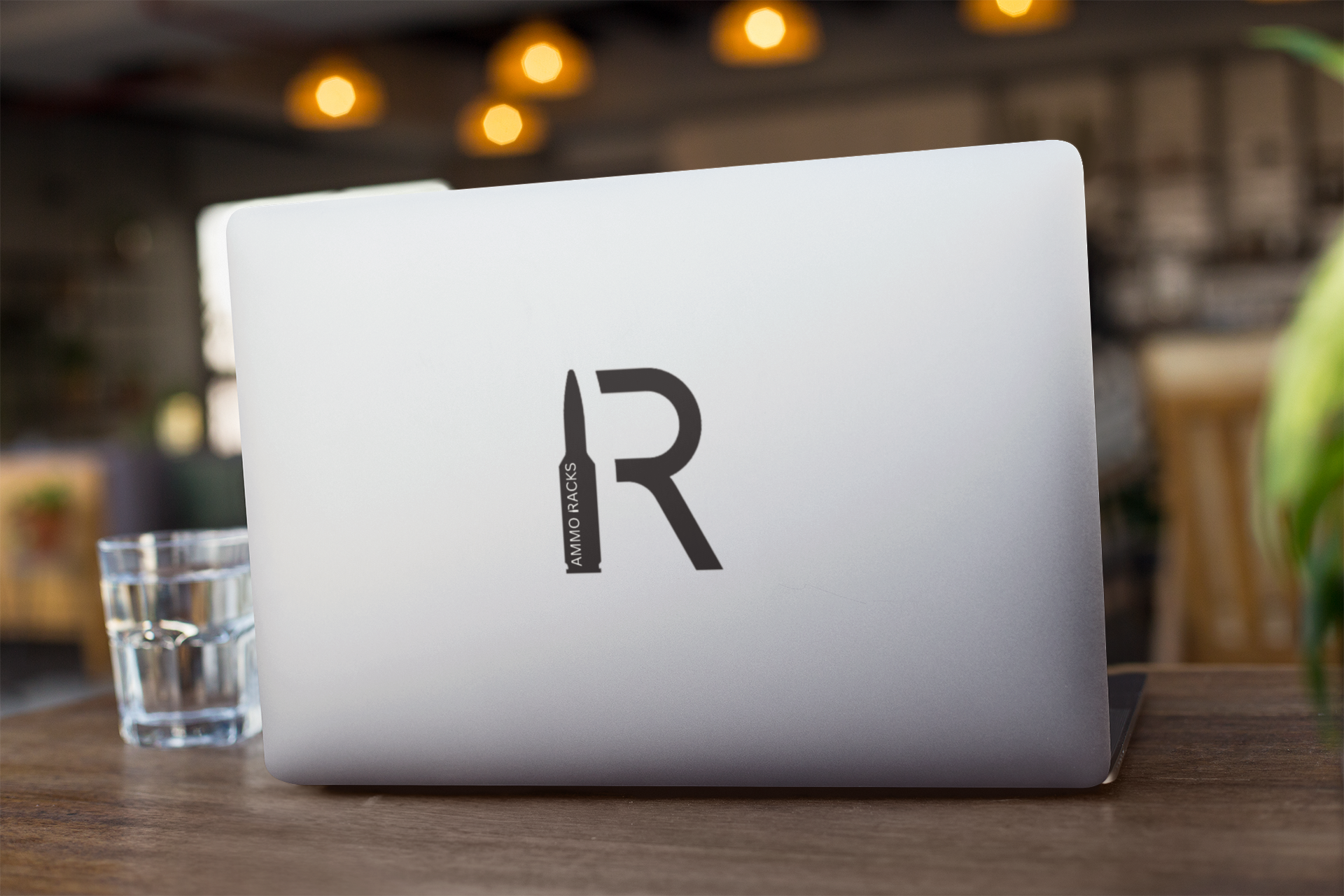 laptop-sticker-mockup-of-a-computer-on-wooden-table-25214.png