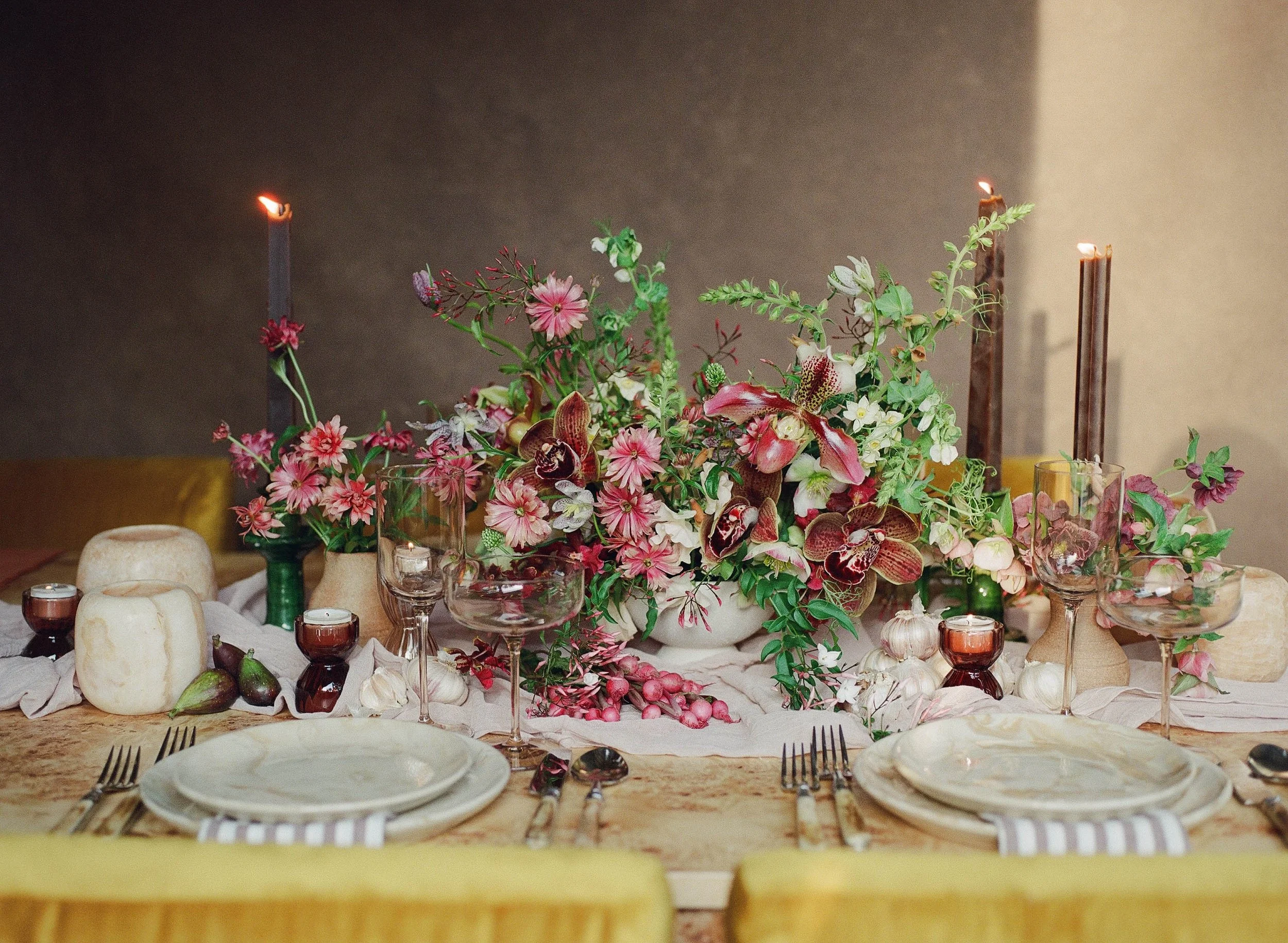 Los Angeles spring wedding floral design using pink, burgundy, brown, purple flower and orchidss and