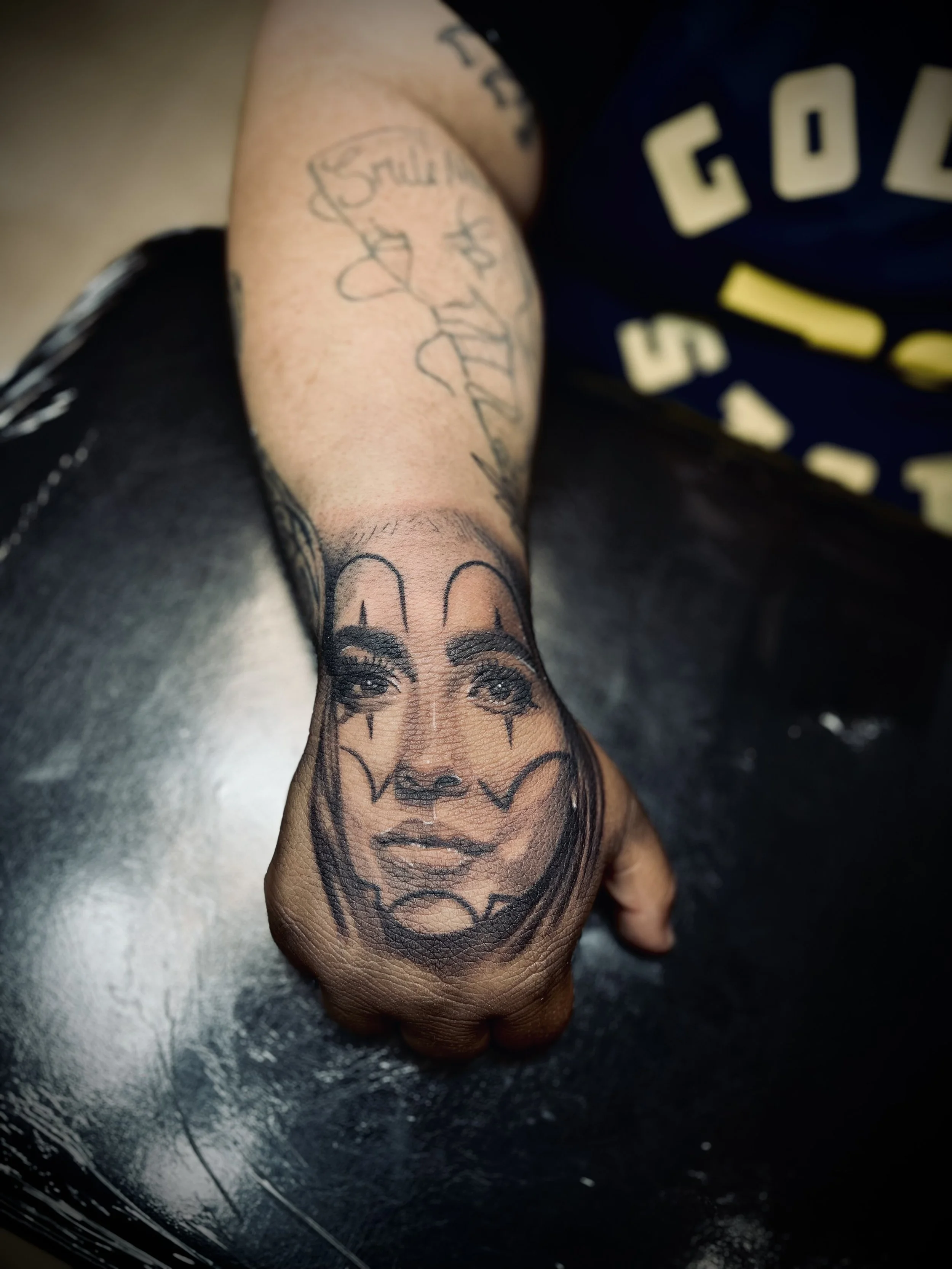 Names are old, get her face tatted
Book your next Black and grey Chicano style 