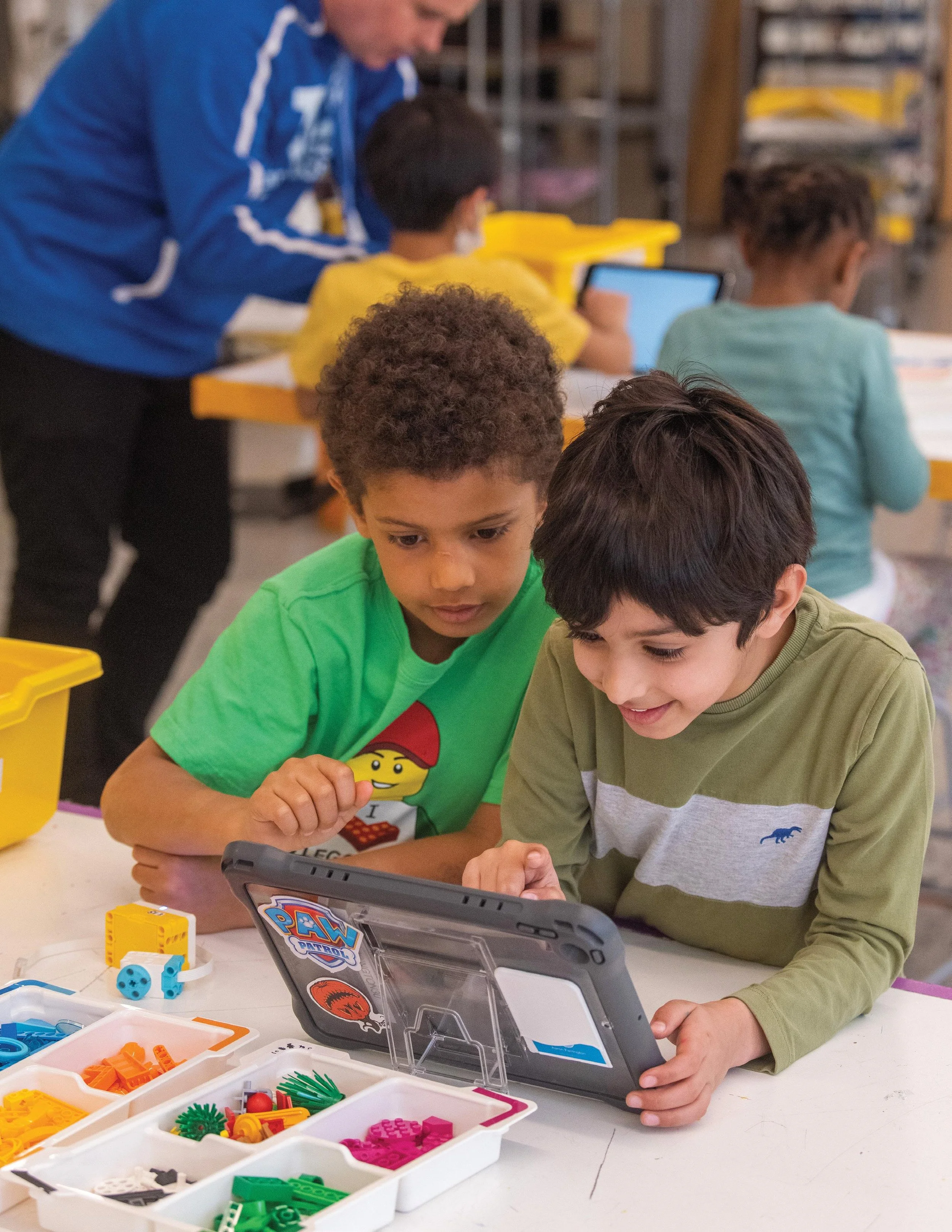 STEM workshop table set up for building and coding.
