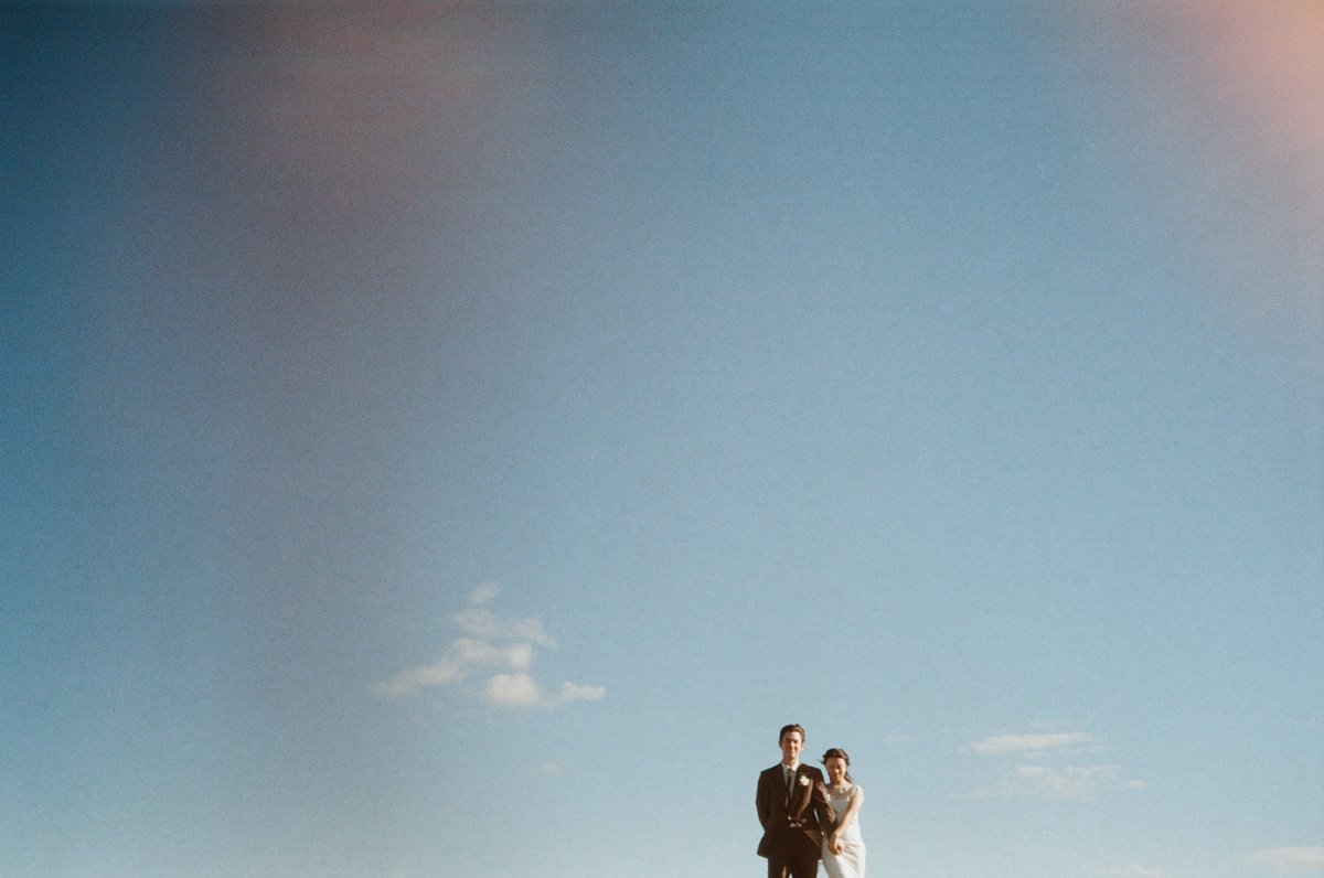 blue sky and small wedding couple film