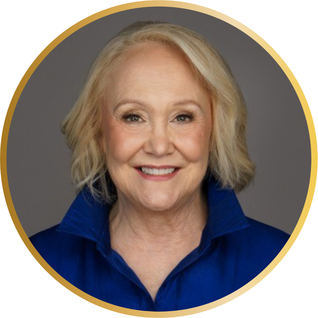 Liz Wool, Founder and CEO of Public Speaking and Presentation Pros, smiling professional headshot wearing a blue top against a neutral background.