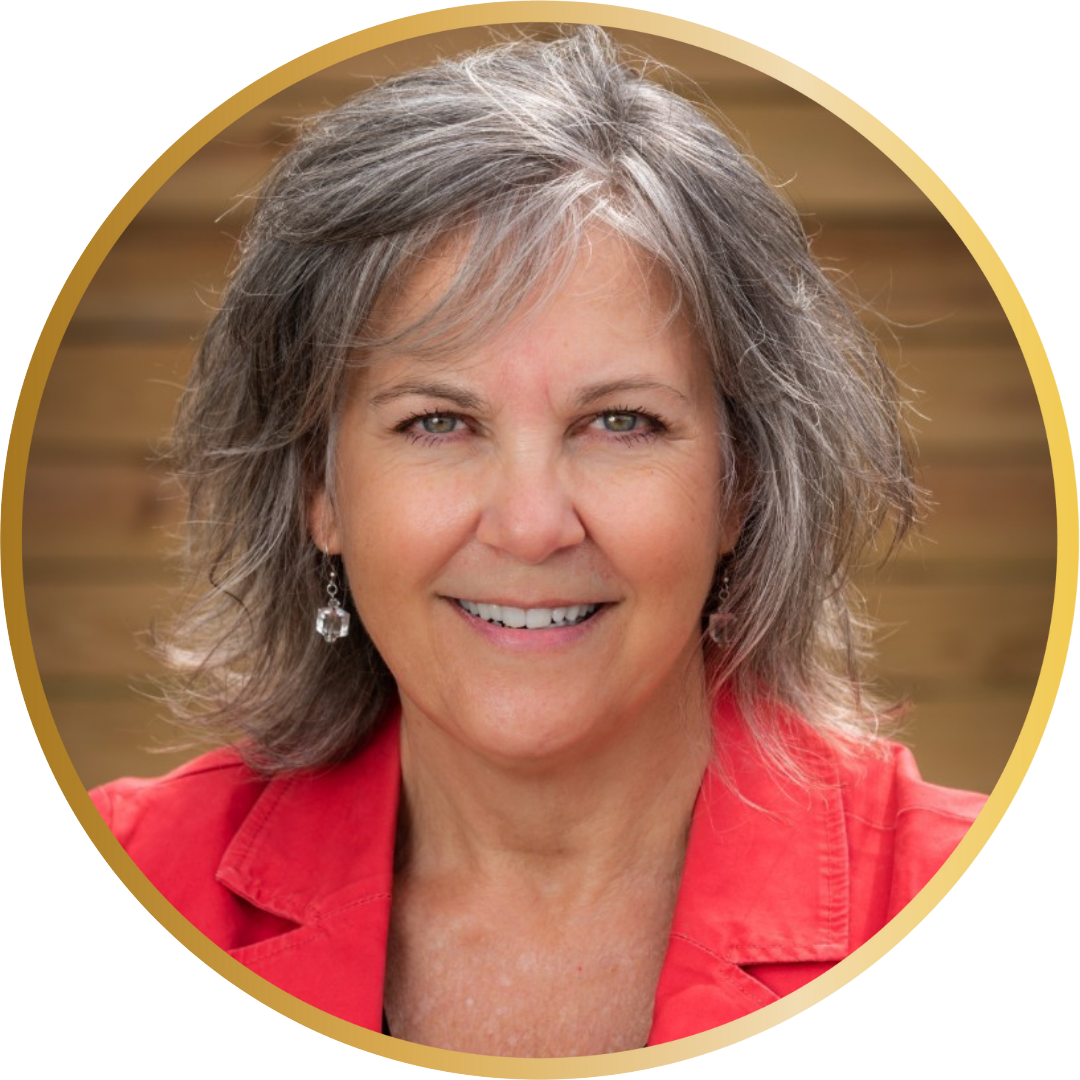 Elizabeth Moss, NAWBO Nashville President, professional headshot smiling while wearing a red blazer against a neutral background.