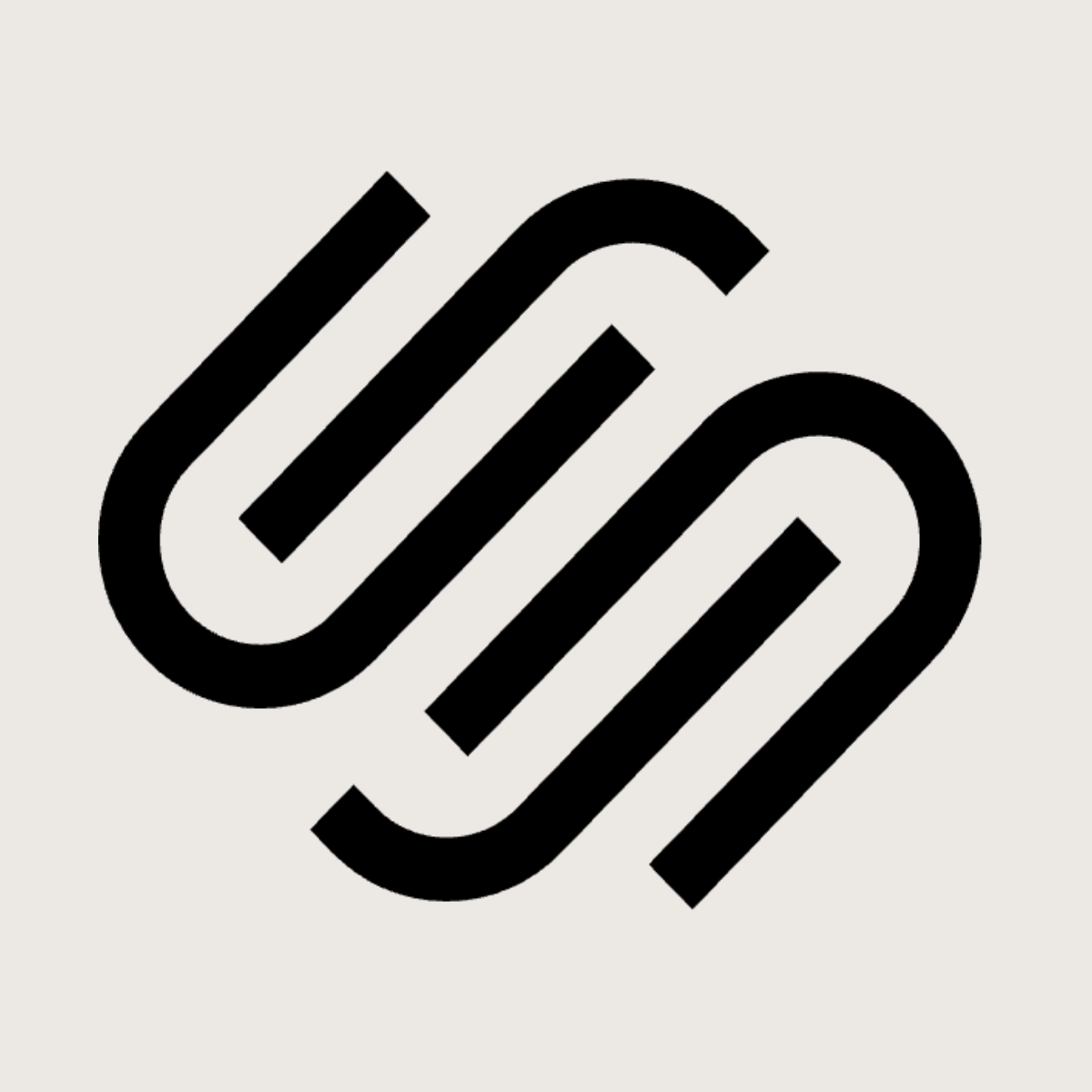 Squarespace logo representing the website design and hosting platform recommended by Kendra Harris, featuring the black interlocking Squarespace symbol on a light neutral background.