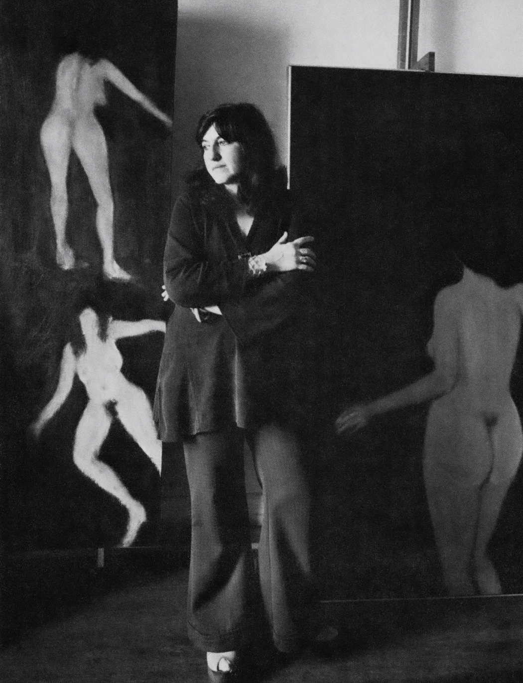 Rosalyn Drexler with paintings by Sherman Drexler, New York c. 1970s. Photo by Nancy Crampton.
