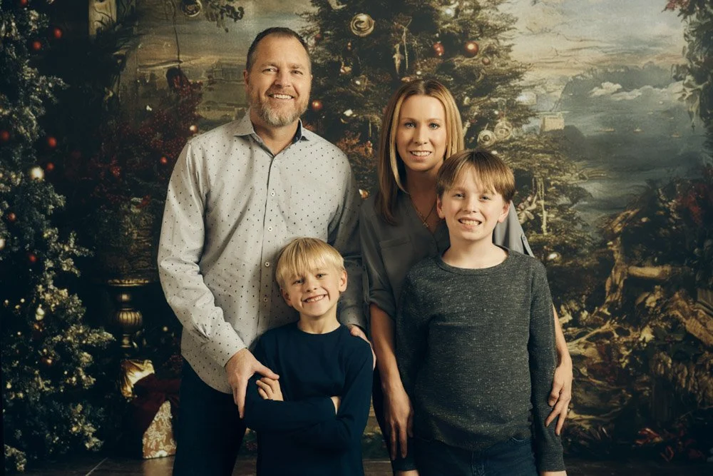 Family photographed together in a studio family portrait session at The Portrait Lab in Franklin, Tennessee