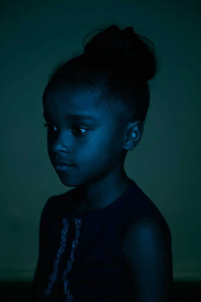 Child photographed in a relaxed studio portrait session near Nashville