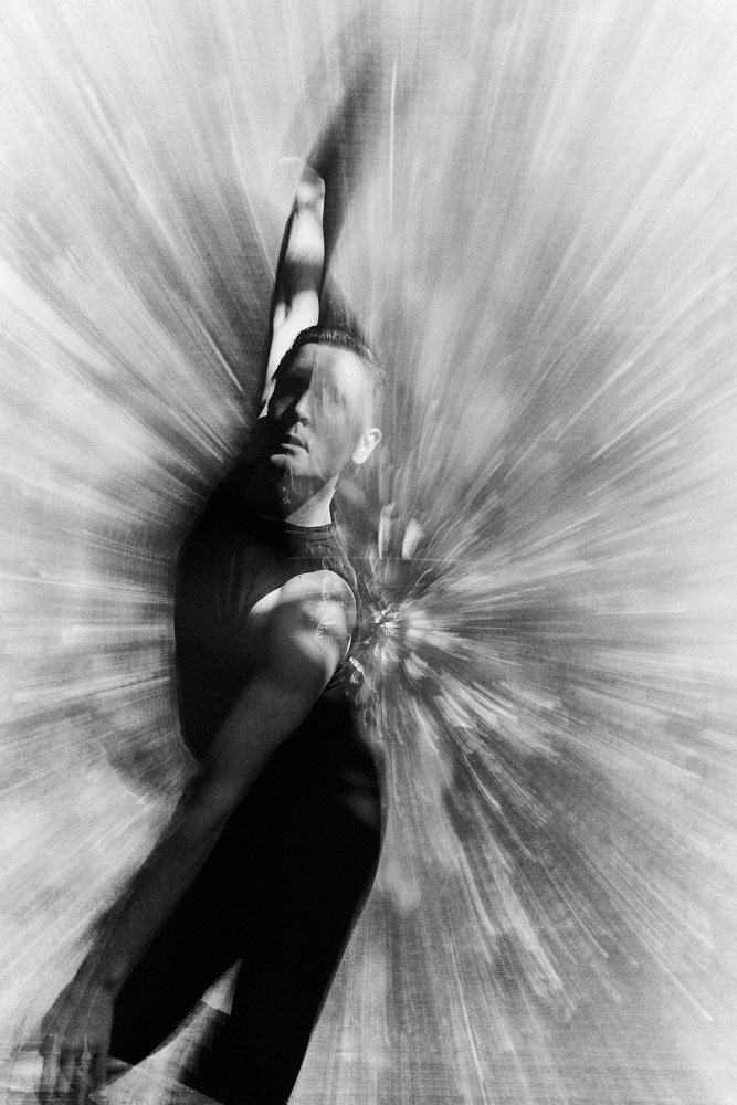 Dancer in motion against a clean studio backdrop near Nashville