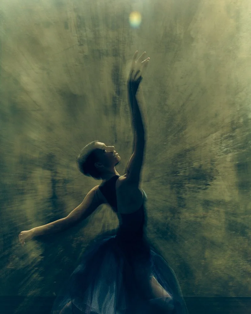 Dance portrait lit with dramatic studio lighting