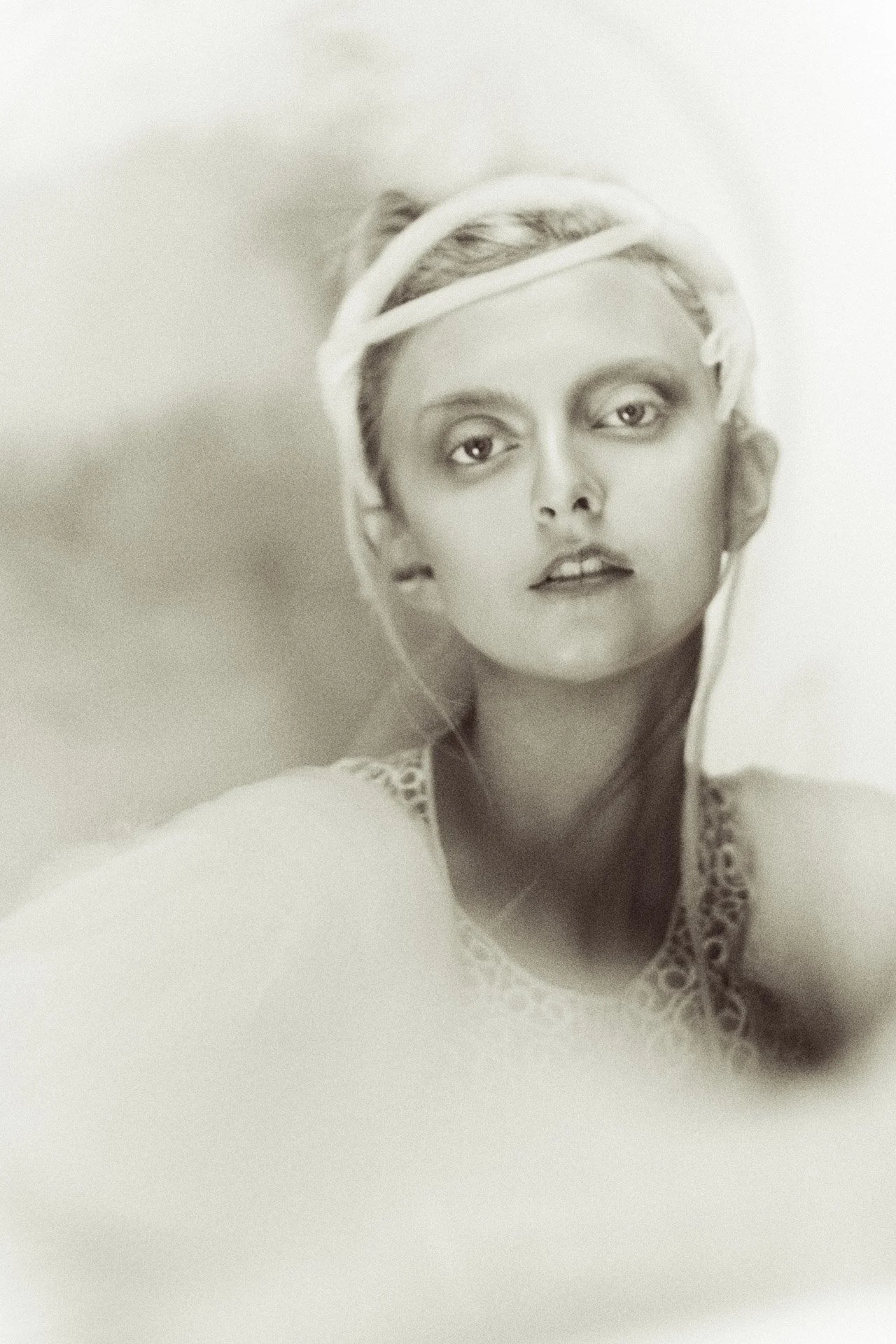 Bridal portrait photographed against a clean studio backdrop near Nashville