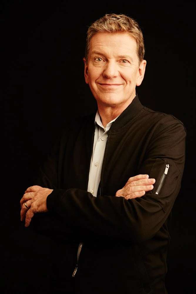 Actor-style headshot with a natural, relaxed expression