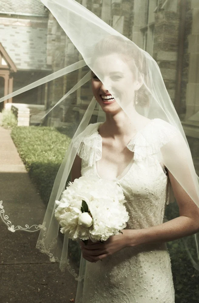Bridal portrait photographed against a clean studio backdrop near Nashville